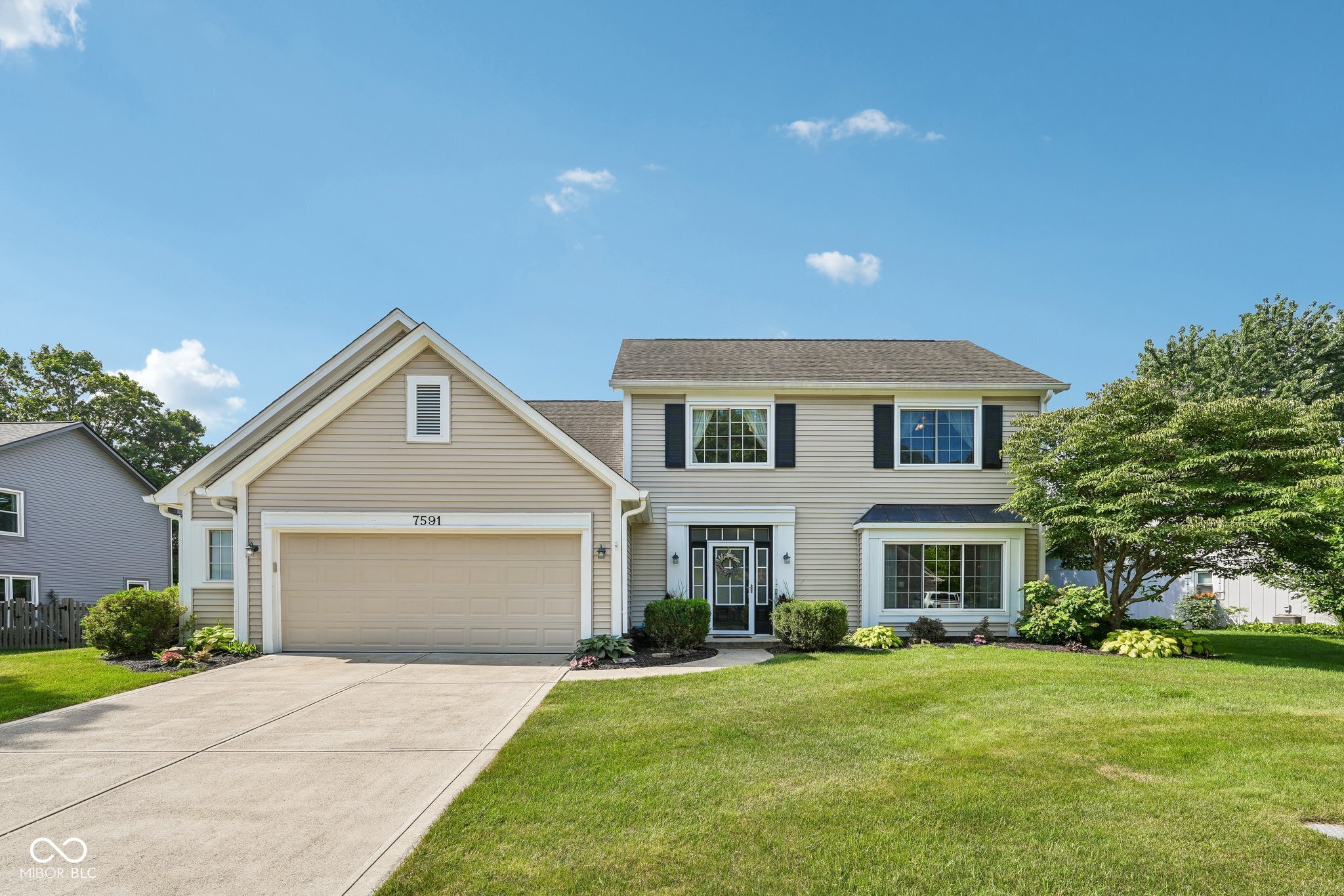 Welcome home to this charming 4-bedroom, 2.5-bath home nestled in the heart of Fishers! From the moment you step inside, you'll appreciate the bright and inviting floor plan designed for both everyday living and entertaining. The welcoming living room just off the entry is filled with large windows that flood the space with natural light, while the designated dining room provides the perfect setting for everyday meals, holiday gatherings, and entertaining guests. The beautifully updated kitchen features newly painted cabinetry, brand-new countertops, ample cabinet storage, and barstool seating, making meal prep and gathering with friends and loved ones a breeze. Just beyond, the spacious family room offers a cozy fireplace, custom built-ins, and an abundance of windows that create a warm, light-filled atmosphere. A convenient main-level half bath adds to the home's functionality. Upstairs, the spacious primary suite boasts a vaulted ceiling, walk-in closet, dual sink vanity, and a walk-in shower. Three additional generously sized bedrooms and a full hallway bathroom with dual sinks provide plenty of room for guests, a home office, or hobbies. Step outside to enjoy the screened-in porch, complete with windows on three sides, creating the perfect place to relax and unwind while taking in views of the backyard. The spacious backyard offers plenty of room for entertaining, gardening, or play and includes a patio and an adorable storage shed for gardening tools, additional storage or workout space. The oversized 2-car attached garage features a convenient bump-out, providing extra space for storage, lawn equipment, or recreational gear. Located just minutes from the Nickel Plate Trail. Also close proximity to shopping, dining, parks, and everything Fishers has to offer, this move-in ready home is one you won't want to miss!