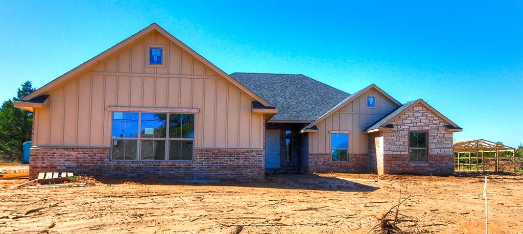 ***Seller is offering $5,000 in concessions that buyer may use towards upgrades, closing costs or even a rate buydown!*** New home under construction in the beautiful new Whispering Winds addition! This 5-bedroom, 3-bathroomstunner offers 2,535 square feet of thoughtfully designed living space on a generous 0.75-acre lot. Enjoy plenty of room for vehicles, hobbies, and storage with a 4-car attached garage and a 30x40 shop! Located in Logan County and Edmond schools, this home features high-end finishes including granite countertops, stainless steel appliances, a cozy wood-burning fireplace, and hand-textured walls and ceilings. The kitchen is equipped with stainless steel appliances, canned lighting, an undermount sink, and plenty of workspace. The primary suite is a true retreat with a spacious walk-in closet and a luxurious bath complete with double sinks. Don’t miss your chance to own a slice of peaceful country living with modern style and convenience! SPECIAL OFFER, 1% BONUS PROVIDED BY PARTICIPATING LENDER TO BE USEDTOWARDS CLOSING COST OR INTEREST RATE BUY DOWN.