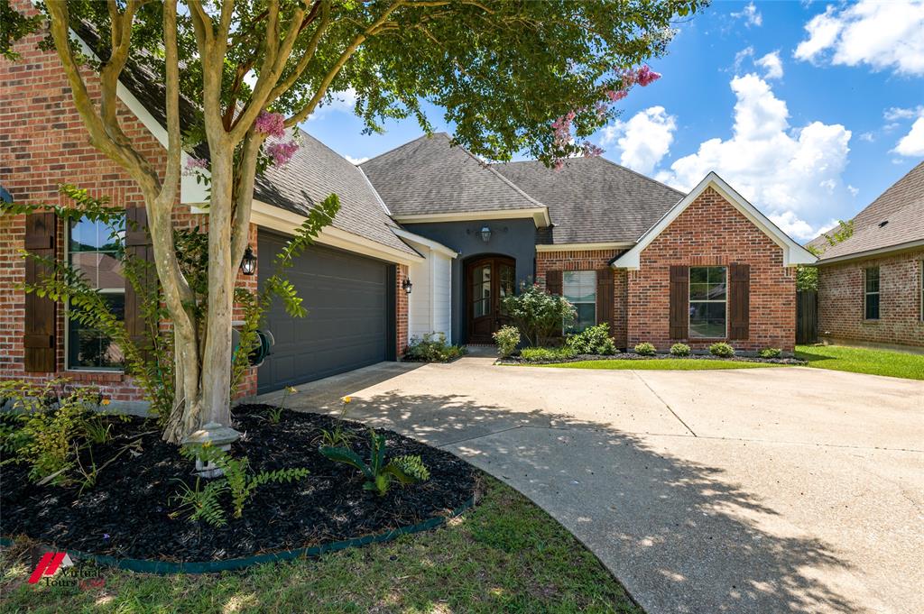 Welcome to this completely renovated, well-maintained 1.5-story home located in a desirable gated community in South Shreveport. Offering 3 bedrooms, 3 full bathrooms, and a spacious bonus room upstairs, this home combines functionality with modern style. The open floor plan features quality finishes throughout, while the private primary suite serves as a true retreat. The luxurious primary bathroom boasts a freestanding soaking tub, oversized tiled walk-in shower with frameless glass enclosure, dual vanities, and an impressive walk-in closet with custom built-in shelving and abundant storage. Upstairs, the versatile bonus room is perfect for a media room, home office, playroom, or guest space. Outside, enjoy attractive curb appeal with professional landscaping and a spacious driveway, all within the security and convenience of a gated neighborhood. Don't miss the opportunity to own this exceptional South Shreveport home that offers comfort, style, and space in one of the area's most sought-after communities.