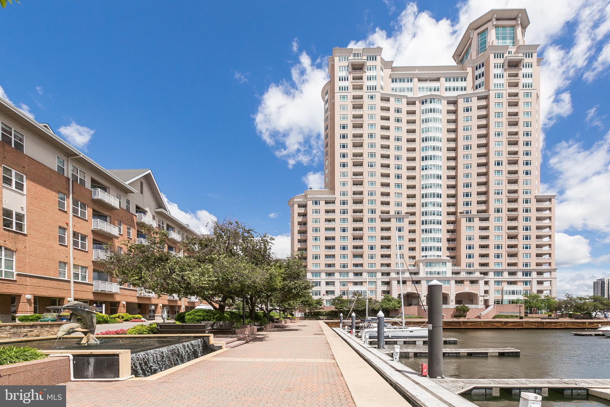 IMPRESSIVE BREATHTAKING VIEWS capture the Inner Harbor waterways and exciting city life all while in the comforts of home!!  Exceptional 1BR plus private den perfect for home office or 2nd BR, 1.5BA's! Open floorplan with 1,129 sf and two balconies overlooking Baltimore’s Inner Harbor, Federal Hill, Pier VI and the Harbor Gateway. Spacious open LR area, Galley kitchen with stainless appliances, lots of countertop, cupboard and pantry space. Stylish features abound including luxury vinyl plank flooring throughout, built-in sound system, California closets, crown molding, recessed lighting, incredible views from each room! Main Suite offers custom designed walk-in closet, private bath with shower plus Jacuzzi tub, marble tile stall shower pan! Price includes gated garage parking (one assigned space) and plenty of guest parking!  Array of building amenities and services for added comfort, luxury and value! 24/7 front-desk concierge, state-of-the-art fitness center, business center, newspaper delivery service, outdoor grill area, social lounge, indoor pool, steam/sauna, guest suites and bike storage. The Harborview Marina & Yacht Club Community offers you the exciting and comfortable lifestyle you deserve! Beautifully landscaped grounds with many water features and park-like sitting areas, brick paved walking/jogging paths, onsite security staff, gourmet deli, and outdoor pool! Close to public transportation, I-95/695, International Airport, MARC, Inner Harbor, Business District, Stadiums, Harris Teeter, Cross Street Market, Baltimore Peninsula, Stadium Square, Federal Hill, Riverside, Rash Field and Locust Point parks, gourmet restaurants and exciting nightlife! A MUST SEE!!