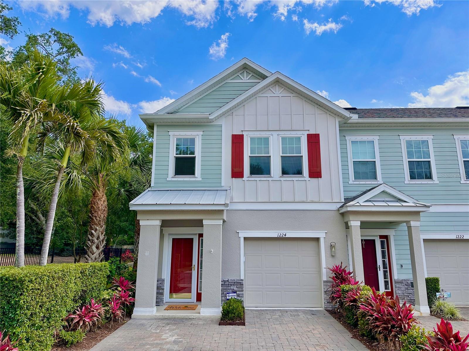 One or more photo(s) has been virtually staged. Welcome to Aqua Solis, a serene retreat nestled in highly sought-after coastal Dunedin. Celebrated for its charm, Dunedin has been recognized by Travel + Leisure as one of the Best Small Towns to Live in the US. This end-unit townhome, constructed in 2018, showcases captivating Key West-inspired architecture set among lush tropical landscaping. Situated in a non-flood zone, just a mile from downtown Dunedin and the Pinellas Trail, this walkable and golf cart-friendly neighborhood is truly a hidden gem. Upon entering, you will find an open-concept living space featuring high ceilings, crown moulding, and stylish plank-style ceramic flooring, perfectly tailored for contemporary lifestyles. The upgraded kitchen stands out with its sleek white cabinetry, elegant granite countertops, tile backsplash, under cabinet lighting and premium stainless steel appliances. A spacious island, pantry closet and ample storage enhance its functionality. From the kitchen, step through the three-panel hurricane impact sliding doors (2019) onto your private lanai featuring new tile flooring (2025) and custom shades, creating your tranquil and secluded oasis. Upstairs, the primary bedroom offers a spa-inspired ensuite bathroom, complete with granite countertops, step-in shower with frameless glass door, double vanities and a large walk-in closet. Two additional bedrooms, along with a conveniently located laundry room complete the second floor. The second full bathroom has been upgraded to feature a new walk-in shower, complete with bench seating and a glass sliding door (2026.) The staircase and upstairs bedrooms also feature upgraded laminate flooring- no carpeting at all. Hurricane impact windows (2019) ensure the protection of your investment and contribute to your peace of mind. Additional updates include water heater (2025), AC (2022), lighting (2026) and freshly painted interior (2026.) This Energy Star-rated home not only means reduced utility costs but also enhances comfort throughout the year. The property features a one-car garage and a two-car paver driveway, providing ample parking space. Experience low-maintenance living with a remarkably low HOA fee. For leisure, enjoy the sparkling community pool or take a quick bike or golf cart ride to Edgewater Drive, where you can indulge in breathtaking waterfront views and stunning sunsets that make living here truly exceptional. Aqua Solis is a boutique gated community offering amenities such as a pool, dog park and community trail. Situated in the golf cart zone, also nearby is the Blue Jays spring training stadium, hospital and historic downtown Dunedin’s charming shops, restaurants, parks, marina, weekly farmers market, and frequent festivals. Paradise awaits at award-winning nearby beaches, including Honeymoon Island, Clearwater Beach, and Caladesi Island. This highly desirable location is just a 30-minute drive to two international airports. Whether as your primary residence or a seasonal escape, this end-unit residence is the opportunity you have been waiting for. Do not miss your chance to own a piece of paradise.