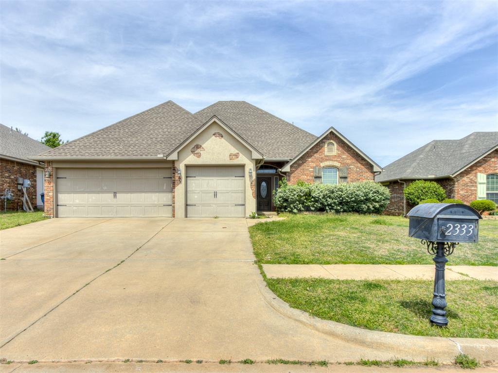 Beautiful 4-Bedroom Home with Bonus Room & New Roof in Prime Edmond Location!
Welcome to 2333 NW 153rd Street – a stunning home featuring 4 bedrooms, 2.5 bathrooms, and 2,210 square feet of stylish living space in one of Edmond’s most desirable neighborhoods.  

This flexible floor plan offers 3 bedrooms plus a dedicated study or optional 4th bedroom, along with a spacious upstairs bonus room complete with a convenient half bath—perfect for a playroom, media room, or home office.  

The open-concept kitchen boasts granite countertops, stainless steel appliances, and ample cabinetry, all framed by upgraded baseboards and crown molding that add a refined touch throughout.  

Enjoy the peace of mind that comes with a brand new roof (installed just a few months ago), Energy Star certification, built-in security system, and full sprinkler system.  

A 3-car garage provides plenty of space for storage and parking. The neighborhood amenities include a community pool and playground—perfect for family fun and relaxation.  

Ideally located just minutes from top-rated Edmond schools, shopping, dining, and easy highway access, this home combines comfort, functionality, and lifestyle into one perfect package.