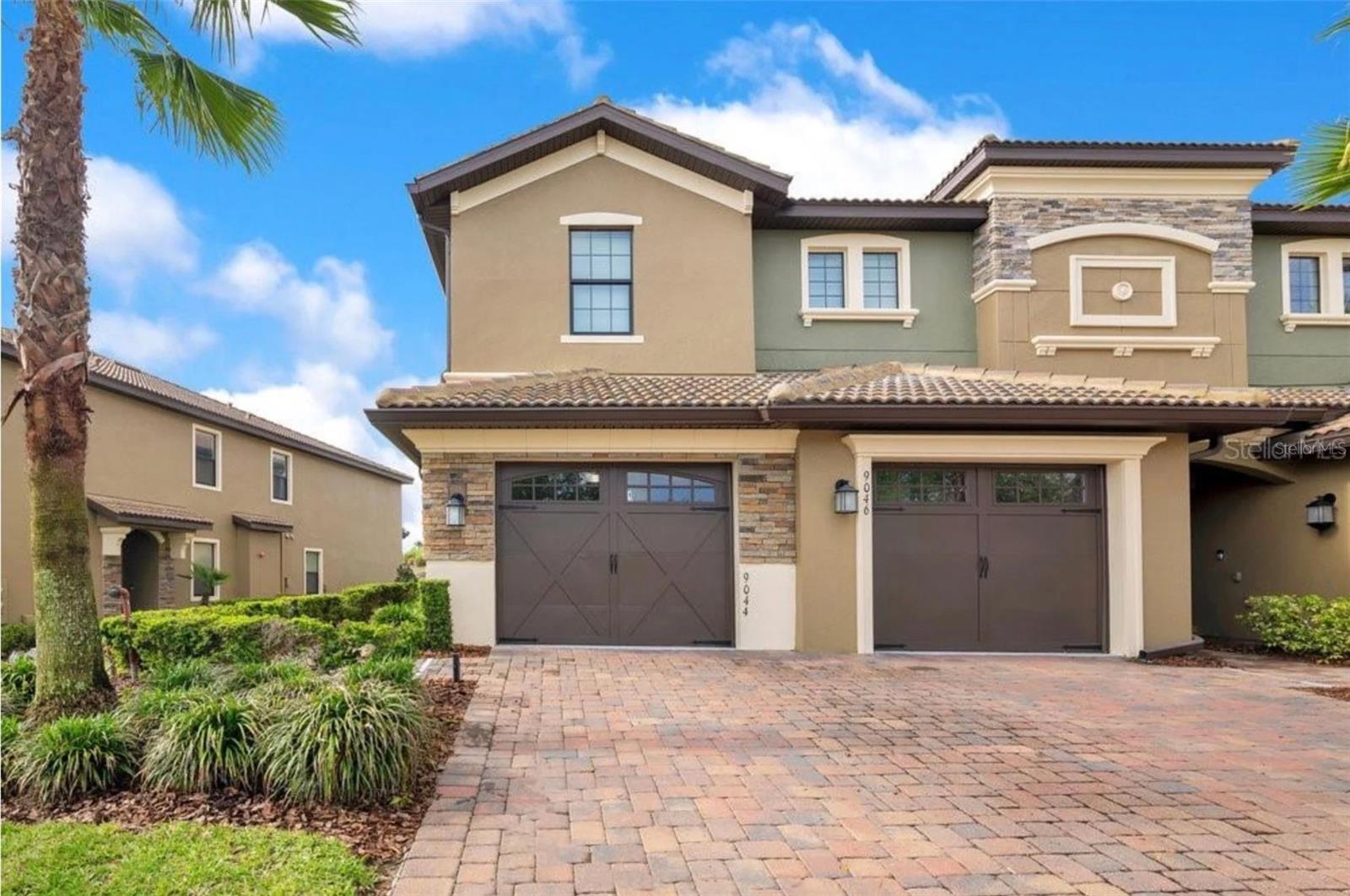 LIKE-NEW, ONE-STORY END UNIT WITH ATTACHED GARAGE AND GOLF COURSE VIEWS! Barely lived in, this beautifully maintained 2-bedroom, 2-bath condo feels almost brand new. The sellers purchased the home with plans to enjoy it as their Florida retirement residence, but a change in life plans has created a wonderful opportunity for the next owner.Located in the highly desirable, 24-hour guard-gated ChampionsGate community, this END UNIT combines low-maintenance Florida living with an impressive collection of resort-style amenities.From the moment you arrive, you’ll appreciate the freshly updated exterior paint and landscaping. Step inside to a bright, open floor plan featuring high ceilings, beautiful tile flooring, abundant natural light, and ceiling fans for added comfort.The stylish kitchen is designed for both everyday living and entertaining, featuring stainless steel appliances, elegant quartz countertops, 42-inch cabinetry with crown molding, a tile backsplash, spacious pantry, recessed lighting, and pendant lighting.The primary suite offers peaceful GOLF COURSE VIEWS, a generous walk-in closet, and a beautifully appointed bathroom with a double-sink vanity. Step outside to the SCREENED-IN LANAI, where you can relax, enjoy Florida’s beautiful weather, and take in the golf course setting.An ATTACHED GARAGE adds convenience and valuable storage, and GOLF CARTS ARE WELCOME, making it easy to enjoy the ChampionsGate lifestyle and community amenities. Even better, this home is located very close to a resident-only gate, providing convenient access in and out of the neighborhood.Ownership includes access to the spectacular 14,000-square-foot OASIS CLUB, featuring resort-style pools, a lazy river, waterslide, splash pad, spa, cabanas, tiki bar, restaurant, movie theater, fitness center, arcade, and more. The community also offers tennis courts and additional recreational amenities.The HOA provides an extensive list of services and benefits, including club access, gated entries, lawn maintenance, exterior building maintenance, trash service, security, pest control, master insurance, internet, and cable. The CDD is included in the property taxes.Ideally located in ChampionsGate with convenient access to golf, shopping, dining, Orlando’s world-famous theme parks, and everything Central Florida has to offer.Whether you’re searching for a PRIMARY RESIDENCE, FLORIDA SECOND HOME, RETIREMENT GETAWAY, or LONG-TERM RENTAL INVESTMENT, this exceptionally well-kept home offers the opportunity to enjoy resort-style Florida living without waiting for new construction.BARELY USED, BEAUTIFULLY MAINTAINED AND MOVE-IN READY—schedule your private showing and come see just how special this home is!