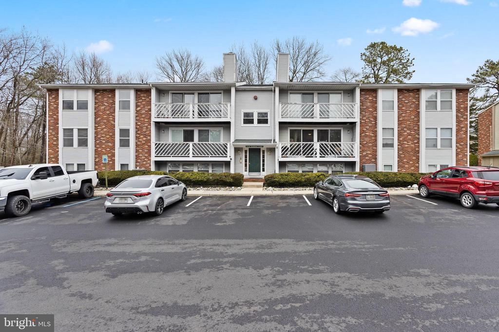 Largest model in Shannon Greene.  Beautiful 1st floor rear unit condo with lots of natural light.  Kitchen offers breakfast bar, pantry, newer refrigerator & add more New Appliances to the list with new stove & dishwasher too! Separate laundry off kitchen with electric dryer & new washer.  HVAC is 6 yrs old.  Plenty of parking & outside storage shed.  Shannon Greene  is beautifully situated amongst Kings Grant nature trails, fishing, & great community amenities.  Come see why Kings Grant is Home Sweet Home!