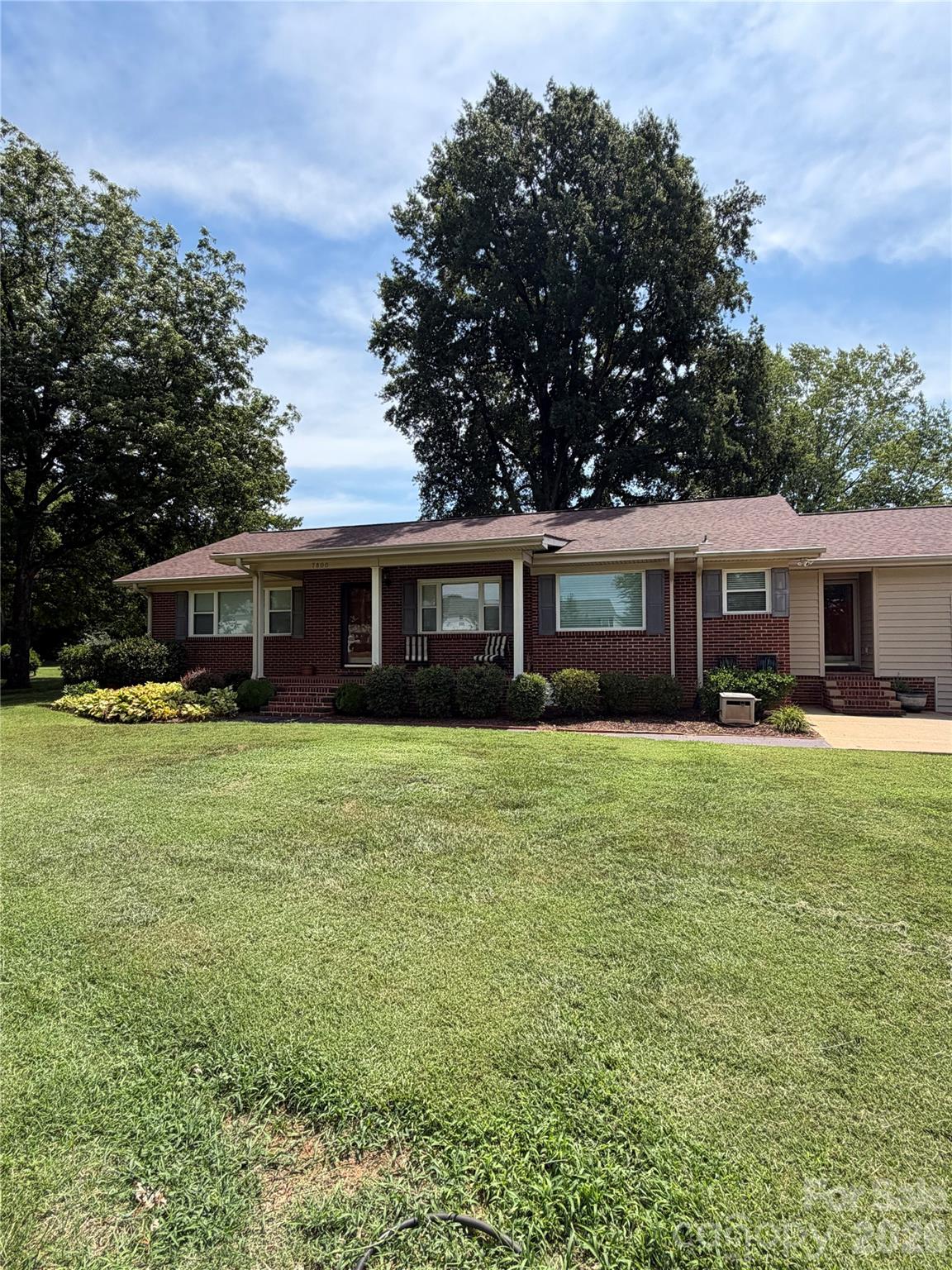 Meticulously maintained and full of timeless charm, this all-brick ranch offers the perfect combination of comfort, space, and convenience—all on a private 0.7+ acre lot. Designed for effortless main-level living, this home has been lovingly cared for and is ready for its next owner. One of the standout features is the thoughtfully designed addition, creating a spacious second living area that's perfect for entertaining, relaxing, or accommodating a growing household. Just off this space is a versatile flex room complete with an attached half bath, making it ideal as a fourth bedroom, home office, guest room, playroom, or hobby space. Outside, you'll enjoy the privacy and room to spread out that a large lot provides, along with a two-car garage and abundant parking for multiple vehicles, boats, trailers, or an RV. Whether you're hosting family gatherings or simply enjoying a quiet evening outdoors, this property offers the space and flexibility that's becoming harder to find. Conveniently located just minutes from Huntersville, this home offers easy access to shopping, dining, parks, greenways, grocery stores, and everyday conveniences, while remaining just a short drive to Uptown Charlotte and everything the Queen City has to offer. If you've been searching for a meticulously cared-for brick ranch with multiple living spaces, flexible room options, a large private lot, and an unbeatable location, this is one you won't want to miss.