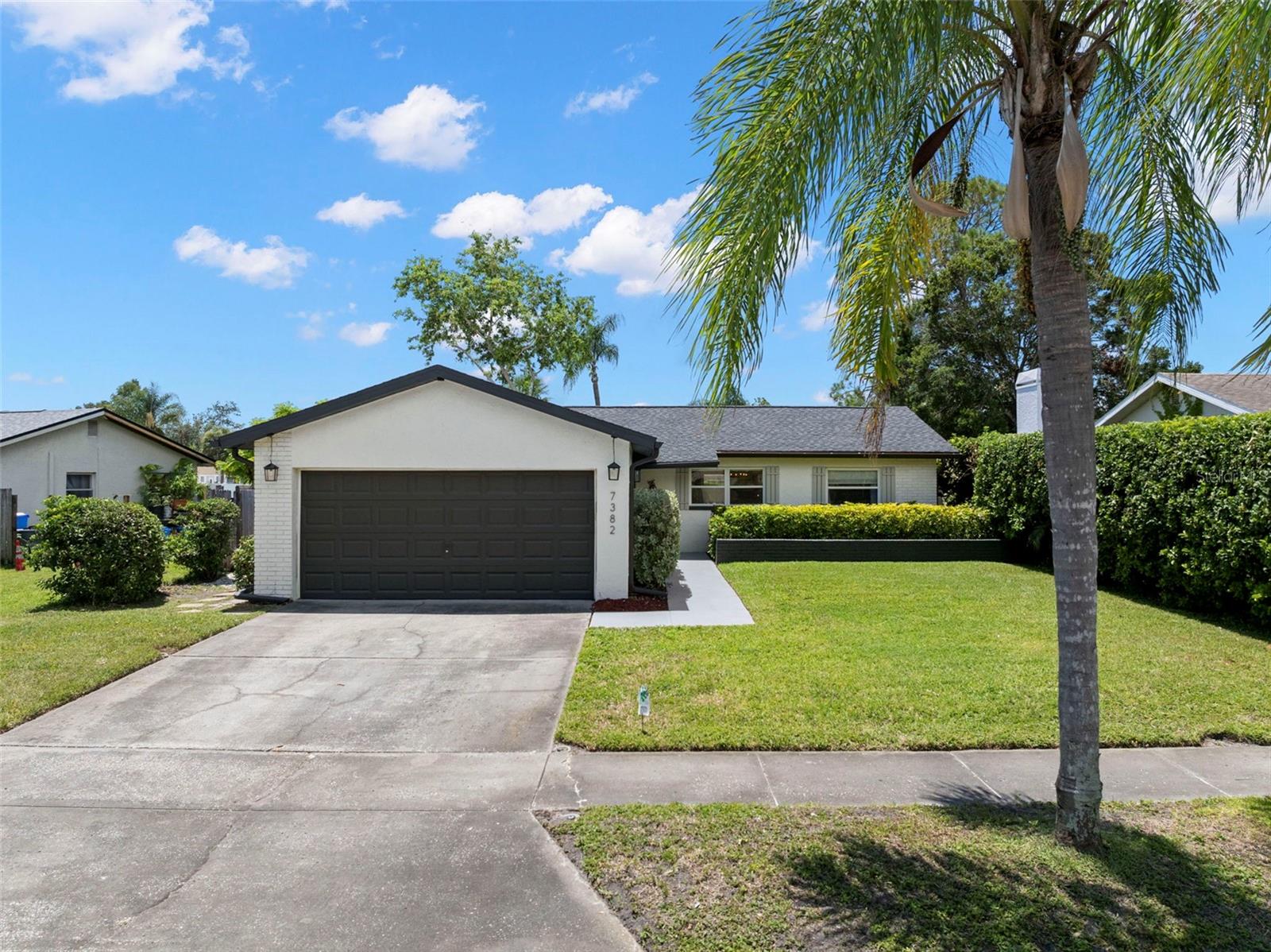 Located in the heart of Pinellas County, this well-maintained, three bedroom, two bath home in Pinellas Park is ready and waiting for you!  Decorated in neutral colors, the warmth of this home is felt as you walk in the door.  Great for entertaining, friends and family will enjoy spending time in the generous living room, snacking around the kitchen island, or enjoying the sunshine on the back deck.  The kitchen is impressive with plenty of storage and counter space for preparing meals.  There is also a kitchen pantry!  An ensuite bathroom with a walk-in shower completes the comfortable primary bedroom.  Privacy is at a premium with a split floor that separates the primary bedroom from the other two bedrooms.  Bedrooms 2 and 3 offer built-in closet organizers to maximize storage.  The hidden gem to this property is the BONUS ROOM which adds flexibility for a playroom, home office, gym- the possibilities are endless!  Roof 2021, HVAC 2022, Newer windows!  Take a virtual tour of the property at https://my.matterport.com/show/?m=VkkafAatRrF then call to schedule a private showing!