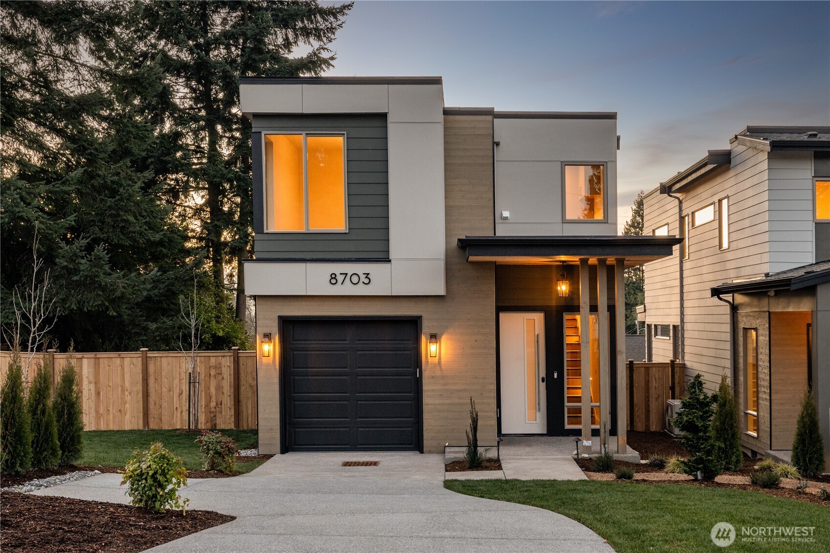 Merit Homes presents Wilder Lot 1! The 4-home community in desirable rose hill offers this thoughtfully designed two-story floorplan offering a reduced footprint without sacrificing luxury or livability. This home features 3 bedrooms, 2.5 bathrooms, a bright, open layout, and an attached EV-ready garage. Step inside to a light-filled open-concept main level ideal for both everyday living and entertaining. The gourmet kitchen showcases a quartz slab island with bar seating, custom soft-close cabinetry, dual-zone wine chiller, and a premium appliance package highlighted by an induction range. The great room is warm and inviting with a sleek contemporary linear electric fireplace and seamless access to the outdoor patio. A stylish powder bath completes the main floor, perfect for guests. Upstairs, the primary suite is a true retreat, filled with natural light and featuring a spa-inspired walk-in shower with bench seating and dual shower heads, plus a walk-in closet with custom shelving. Two additional bedrooms provide ample space, complemented by a full secondary bathroom and a well-appointed laundry room with quartz countertops and upper and lower cabinetry. Ideally located for effortless commuting with quick access to major employers including Microsoft, Meta/Facebook, Amazon, and EvergreenHealth. Enjoy close proximity to Kirkland Costco, The Village at Totem Lake, parks, walking trails, and top-rated schools.
