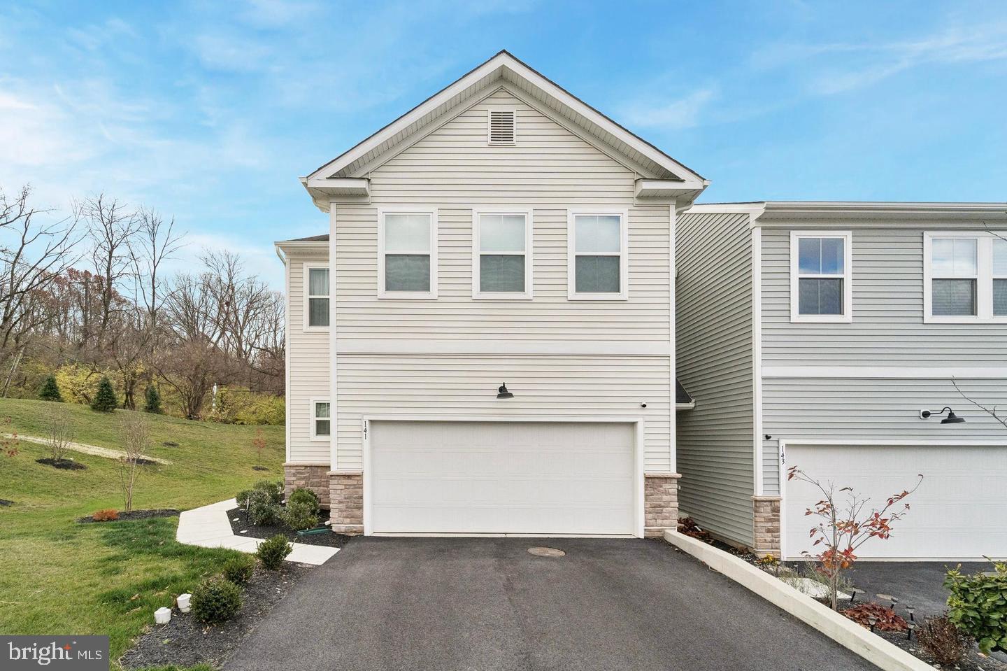 Relocation has made this possible! Price is 40k below what he paid for the home. DOWNINGTOWN EAST SCHOOLS AND CLOSE TO STEM!!! Discover an exquisite opportunity to embrace a lifestyle of luxury and comfort in this stunning end-of-row townhouse located in the prestigious Clover Mill community. Built in 2024, this residence showcases a harmonious blend of traditional architectural elegance and modern sophistication, making it the perfect sanctuary for discerning homeowners. Step inside to find an open floor plan that invites natural light to dance across the beautifully crafted hardwood and luxury vinyl plank flooring. The spacious living area seamlessly flows into the gourmet kitchen, where culinary dreams come to life. Featuring upgraded countertops, a central island, and stainless steel appliances-including a built-in microwave, gas range, and dishwasher-this kitchen is designed for both functionality and style. A generous pantry ensures ample storage for all your culinary essentials. Retreat to the luxurious primary suite, complete with a walk-in closet and an en-suite bathroom that exudes spa-like tranquility. The thoughtfully designed layout includes two additional bedrooms and two and a half elegantly appointed bathrooms, providing ample space for relaxation and privacy. Every detail has been meticulously curated, from the recessed lighting that enhances the ambiance to the tasteful window treatments that frame picturesque views. The fully finished basement offers additional living space, perfect for a home theater, gym, or play area, catering to your every need. Outside, enjoy the serenity of your corner lot with a private deck, ideal for entertaining or unwinding after a long day. The Clover Mill community enhances your lifestyle with amenities such as common grounds, a dog park, and picnic areas, fostering a sense of community and connection. Parking is a breeze with an attached two-car garage and additional driveway space, ensuring convenience for you and your guests. The association takes care of common area maintenance, lawn care, snow removal, and trash services, allowing you to focus on what truly matters-enjoying your luxurious home. This property is not just a home; it's a lifestyle choice that offers the perfect blend of elegance, comfort, and community. Experience the best of modern living in Clover Mill, where every day feels like a retreat. Don't miss your chance to make this exceptional residence your own.