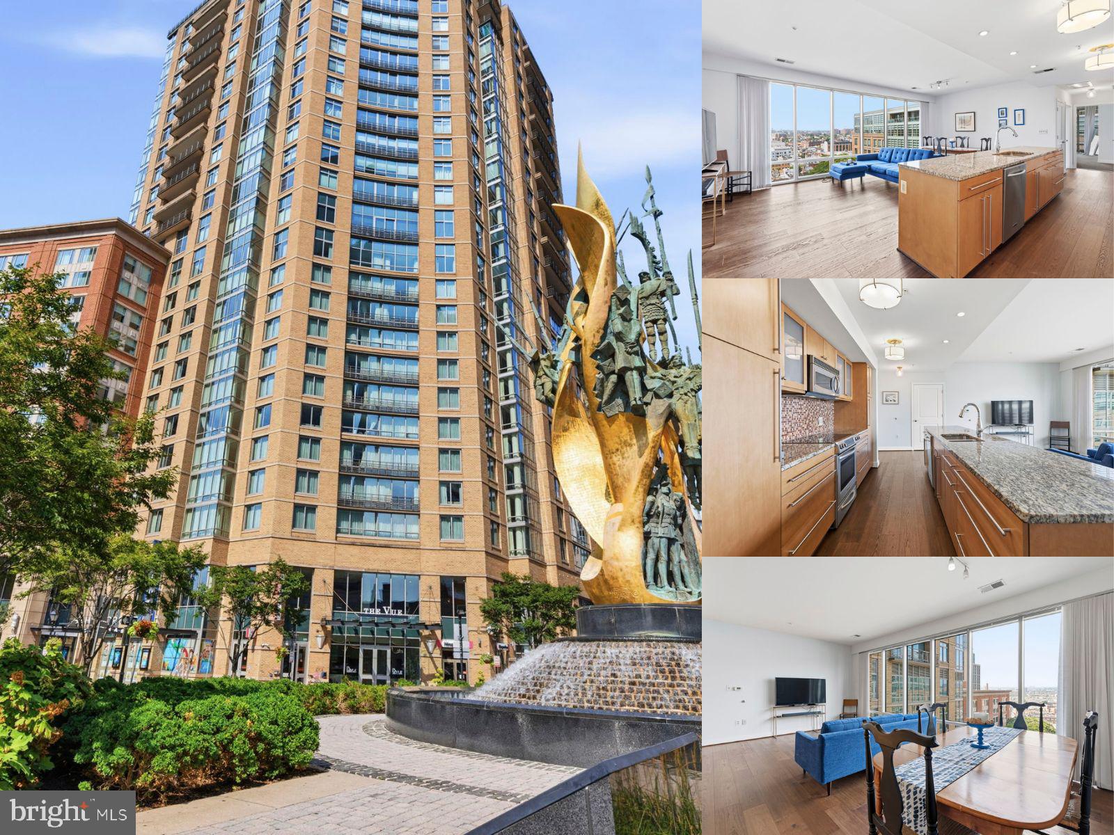 This 2-bedroom, 2-bath contemporary condominium in The Vue delivers sweeping city views, dramatic walls of windows, and a light-filled open-concept layout in the heart of Harbor East. Engineered wood flooring flows through the main living spaces, where the spacious living room, dedicated dining area, and kitchen come together for effortless everyday living and entertaining. The kitchen makes a strong impression with granite countertops, stainless steel appliances, extensive cabinetry, a mosaic tile backsplash, and an oversized center island offering abundant workspace and seating potential. The primary suite is wrapped in natural light and features a generous walk-in closet and spa-inspired private bath with a double-bowl granite vanity, soaking tub, and separate glass-enclosed shower. A well-proportioned second bedroom and full bath offer flexibility for guests, a home office, or additional living space. In-unit laundry, elevator access, concierge service, and one assigned parking space complete this polished Harbor East residence.
