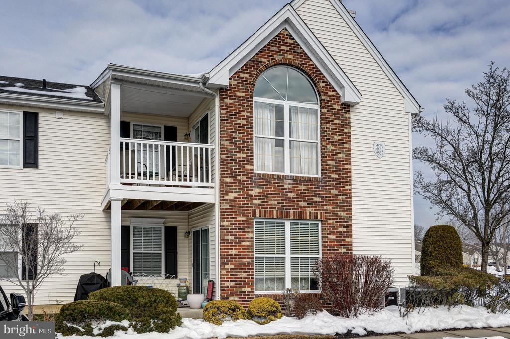 Welcome to 2702 Bluegrass Dr, Unit B, a move in ready 1300 Sq ft. , second floor home,  nestled in the desirable Holiday Village East community.  This inviting residence offers a comfortable layout with bright, open living spaces.  The open floorplan seamlessly flows into the dining space and kitchen for everyday convenience. Generously sized rooms provide flexibility for a variety of lifestyles. Two generously sized bedrooms, the primary has an ensuite and walk in closets. Guests have access to the full bath. Large Laundry and  multiple storage rooms for your convenience. The roof was replaced in 2023and you have a new HVAC unit replaced in 2025. Large windows and glass sliding door that opens to the porch allow for abundant natural light, creating a warm and welcoming atmosphere. HOA provides common area landscaping, snow removal, access to community amenities (pool and clubhouse). HOA fees: $302.00/Mo plus $88.00/mo. CSALocated in a quiet, residential setting, this property offers close proximity to major highways, shopping, dining, and parks, while still providing a peaceful retreat.