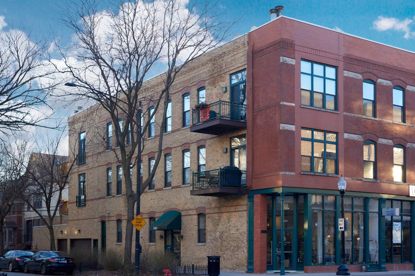Prime Lincoln Park/DePaul location! This spacious 2 bed/2 bath end-unit condo checks every box. Recent updates include brand-new bedroom carpet, newer central air, newer windows, and refinished hardwood floors. The home is filled with natural light from oversized windows and offers an open, easy floor plan that works beautifully for both everyday living and entertaining. The updated kitchen is a standout with stainless steel appliances, granite countertops, and an expanded center island that offers plenty of bar seating. It opens to the expansive living room with a cozy wood-burning fireplace and direct access to your private 14x10 deck-perfect for grilling, lounging, and soaking up the southern exposure. The spacious primary suite includes a walk-in closet and a private bath, offering a comfortable retreat at the end of the day. Other must-haves include in-unit laundry, garage parking (included in the price), a extra storage, and a quiet setting away from street noise. All this in a walk-to-everything location just steps to shops, restaurants, nightlife, and three CTA train lines.