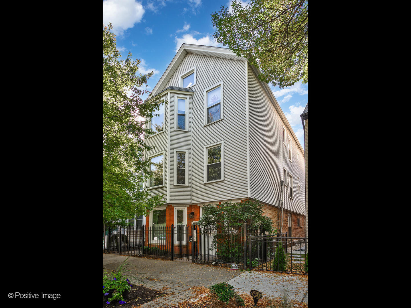 Experience the vibrant charm of Lake View in this stunning 2-bedroom, 2-bathroom condo, where cuisine, culture, and lively street music create an unmatched lifestyle. Bathed in natural light, this home features soaring 10-foot ceilings, freshly stained oak hardwood floors, a spacious private deck, a yard, and convenient garage parking.  The bright living room, illuminated by expansive bay windows, offers a cozy gas fireplace and a dedicated office nook. The gourmet kitchen is a chef's dream, equipped with 42-inch maple cabinets, newer stainless steel appliances, ample counter space, a center island, and a dining area that flows seamlessly onto the oversized deck-perfect for entertaining.  Both bedrooms are generously proportioned, with the king-sized primary suite boasting a luxurious double vanity, a Bluetooth-enabled LED mirror with adjustable brightness, and a walk-in shower with a bench. Additional highlights include a modern LG washer/dryer, a newer furnace and AC, and abundant organized closet space.  Located just blocks from the Brown Line and three exceptional parks: Wiggly Field Dog Park, with ample space for running, gentle hills, and sandboxes; South Lakeview Park (.78 acres), featuring four basketball courts, volleyball courts, and playgrounds; and the newly developed Margaret Donahue Park (.54 acres), created in partnership with the Chicago Cubs, offering a state-of-the-art playground, rubberized surfacing, a spray feature, enhanced pathways, lighting, seating, and lush landscaping. Embrace Lake View's dynamic energy in this exceptional condo!