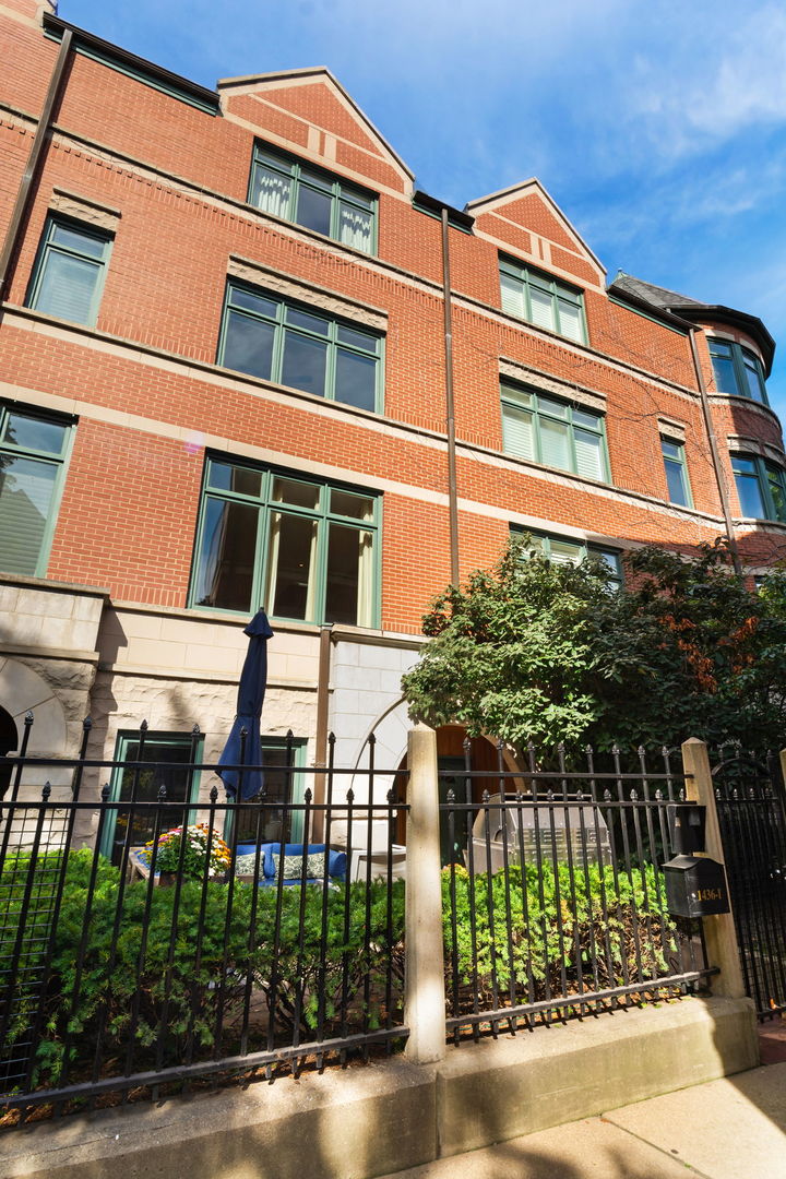 Desirable Park Row townhome featuring three bedrooms, two and half bathrooms, contemporary updates throughout and a prime South Loop location. Situated on a quiet tree lined street in a gated complex with a welcoming patio and foyer entry. First floor family room with is a versatile space could be used as home office. Spacious open concept living and dining area with gas fireplace, chic lighting fixtures, hardwood floors throughout, and filled with natural light from the large south facing windows. Updated kitchen offers sleek white cabinetry with plenty of storage space, eat-in island, granite countertops and subway tile backsplash. Powder room located on the main living level. Sprawling full floor primary suite with vaulted ceilings, hardwood floors, wall to wall closets, and a sitting area with fireplace. Updated primary bathroom features a contemporary dual sink vanity and glass enclosed rain shower. The second and third bedrooms are spacious with lots of natural light and ample closet space. Large guest bathroom with dual sink vanity, tub shower combo and linen closet. Side by side washer dryer conveniently located on the bedroom level. Attached oversized single car garage. Excellent South Loop location with many neighborhood parks and just minutes from larger attractions like Grant Park, Museum Campus, the Lakefront Trail, shops, restaurants, and nightlife with convenient access to the Loop, transit, and expressways.
