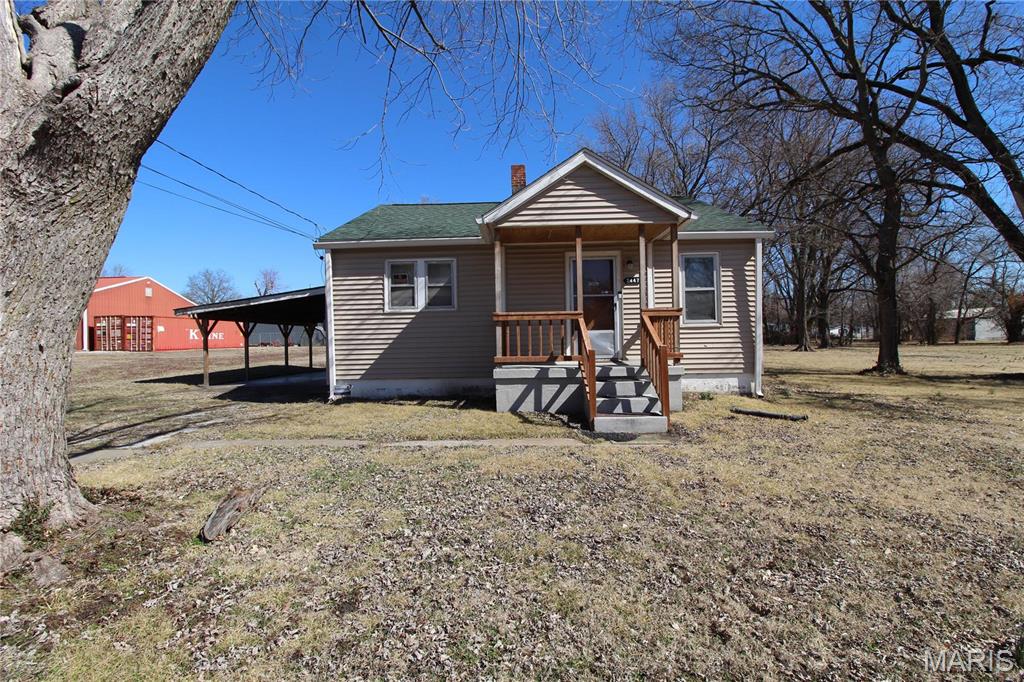 Plenty of potential in this 5 bed/2 bath home. Inside you will find the living room, large eat-in kitchen, generously sized bedrooms, and 2 full baths. Off the kitchen is access to the laundry area which leads to the exterior door for the carport or you can head down to the full unfinished basement with plenty of storage space. Sitting on a .33 lot with a shed for additional storage. Property is being sold AS IS, sellers to offer no clean out, warranties, repairs, or inspections, including occupancy. Price adjustment due to flat roof over 2 bedrooms.