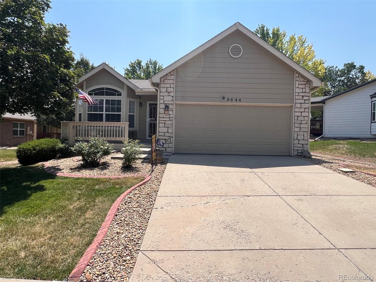 Welcome to easy, low-maintenance living in the sought-after 55+ community of Peak View Village!This beautifully updated ranch-style home offers true main-floor living with vaulted ceilings, two bedrooms, two bathrooms, and a spacious, comfortable floor plan.  Step inside to a welcoming living room featuring a cozy gas fireplace and adjoining dining area. The open kitchen offers plenty of cabinet and countertop space, creating a functional and inviting setting for everyday living and entertaining. The spacious primary suite features a walk-in closet and an updated private full bathroom. A generously sized secondary bedroom and three-quarter bathroom provide comfortable accommodations for guests or a home office. Main-floor laundry adds even more convenience. A newer sliding glass door (2020) from Renewal by Andersen leads to the freshly painted covered deck overlooking a peaceful yard area -perfect for relaxing, entertaining, or enjoying Colorado's beautiful weather. The attached oversized two-car garage provides additional convenience and plenty of storage.Need more space? The full unfinished basement offers tremendous potential for future living space, a workshop, hobbies, or all the storage you could want.  A newer roof and gutters (2023) provide peace of mind. Newer water heater (2020) as well.All of this is located in a fantastic location close to shopping, dining, worshipping, entertainment, and everyday conveniences.Comfortable, updated, and easy to maintain, this is the kind of home that makes 55+ living easy!