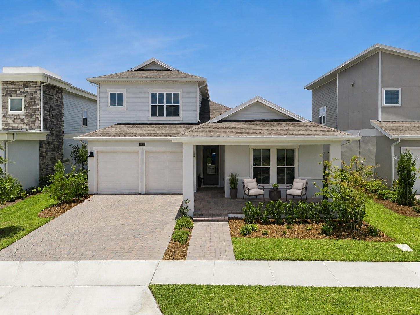 Virtually Staged. Water views as soon as you enter, and sunsets from the lanai. Welcome to 10020 Ballast in Laureate Park, Lake Nona's most connected community. Looking for a One-Story Home with a "Pop-Up" Bonus Room and En Suite Bedroom and Bathroom Upstairs? This is the one! This gently lived-in 5-bedroom, 3.5-bathroom home with DOWNSTAIRS PRIMARY offers 3,068 square feet of modern comfort in the heart of Medical City. Built in 2024, this is the Craft Homes Fontana floor plan; a design that is no longer available through the builder, making this your last opportunity to own this layout brand new-ish in Lake Nona. The moment you walk through the door, water views greet you...setting the tone for everything this home delivers. Wood look plank tile flows through the downstairs living areas, and a split floor plan ensures space and privacy for everyone. The Gourmet Kitchen is the heart of the home, featuring Quartz Countertops, contrasting cabinetry with a light surround and dark island, a Vented Hood, Double Oven, and Samsung refrigerator. A Dedicated Dining space sits nearby, making entertaining feel natural. Step through the Triple Pocket Sliding Glass Door onto the Covered Lanai already outfitted with a Summer Kitchen Hookup and no rear neighbors in sight. There's plenty of room to add a pool and make this your own private outdoor retreat, especially with the sunsets you'll see back here! The downstairs primary suite waterviews are heavenly, and you'll also have 2 walk-in closets, with a spa-like bathroom featuring a Freestanding Tub, Frameless Glass walk-in shower with Rain Shower head, and thoughtful finishes throughout. The Laundry room is also conveniently located downstairs, complete with Upper Cabinetry and a Samsung washer and Dryer. The Fontana's upstairs retreat adds incredible flexibility: a huge Bonus Room plus a Private Bedroom with its own dedicated Bathroom, making for a perfect guest suite or the family member that needs more privacy on the 2nd floor. This EAST-FACING Laureate Park home captures the most fabulous sunsets over serene water views from the backyard every evening. Zoned for the brand-new Luminary K-8 Community School, with HOA-included high-speed internet, resort-style amenities, and Lake Nona West just minutes away with world-class dining, shopping, and entertainment close by. If you've been searching for a spacious home in Laureate Park with water views, a flexible floor plan, and a sunset that stops you in your tracks, this is the one.  Laureate Park esidents enjoy the LP Aquatic Center, LP Fit fitness center, tennis, pickleball, basketball, and sand volleyball courts, plus over 44 miles of trails connecting lakes, parks, and green spaces throughout the community. A dog park, community garden, playgrounds, and the Village Center, home to Canvas Restaurant and Market round out one of Lake Nona's most sought-after addresses. Minutes to Boxi Park, Orlando International Airport, Lake Nona Performance Club, Wave Hotel, UCF Hospital, Nemours, VA and more! High-speed internet is included. Schedule your private tour today and experience the Lake Nona lifestyle you've been waiting for!
