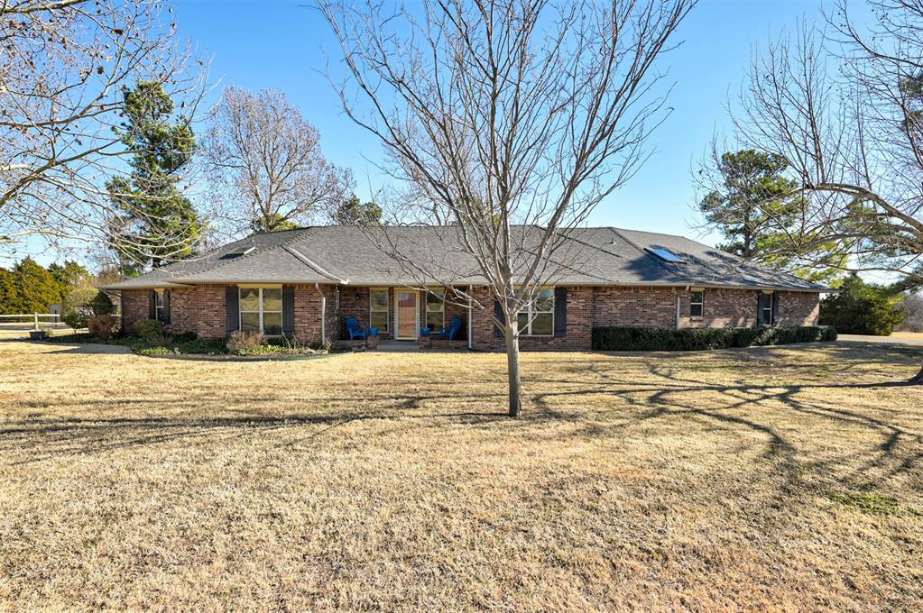 Enjoy the peacefulness of the countryside while staying conveniently close to downtown Edmond with easy access to OKC! This fabulous home, set on 1.69 acres, offers the perfect blend of comfort, functionality, and space to roam. Inside you'll find an open, spacious floor plan featuring vaulted ceiling and a cozy fireplace in the family room. In addition to the large dining area, breakfast bar, and built-in desk make this home both practical and inviting, you will also find spacious bedrooms with a convenient jack n jill bathroom. The enormous laundry room provides abundant storage and functionality. Plus, enjoy the comfort of a home generator. Outside, you’ll find a storm shelter, storage shed, and an outstanding workshop, complete with heating and air conditioning on one side and a true workshop setup on the other.Metal shops and livestocks allowed. This property truly has it all — space, comfort, and versatility — in a prime location! Schedule your showing today!Buyers to verify all information including schools.