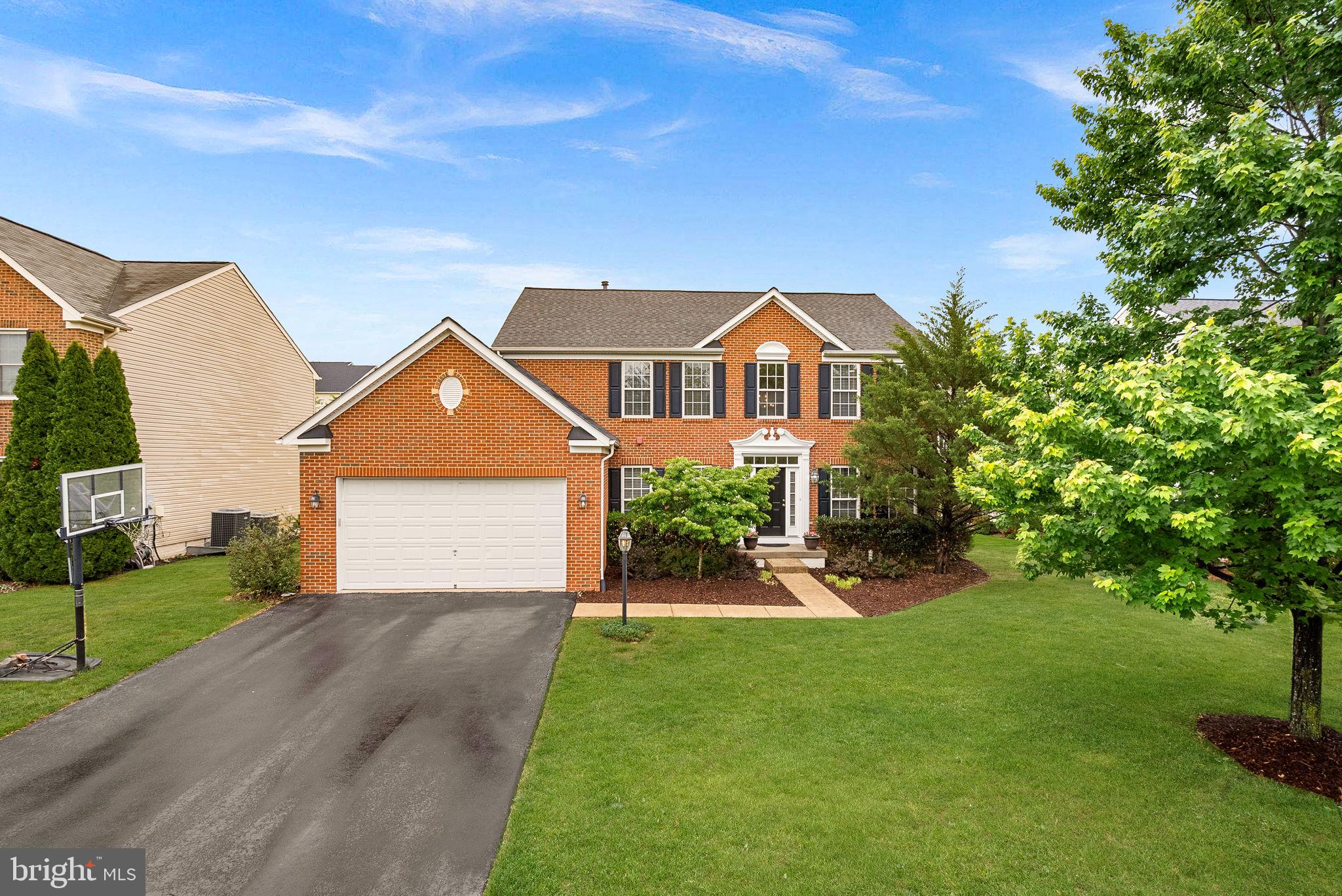 Welcome to 25562 Mindful Court — a beautifully updated home tucked away on a quiet cul-de-sac street in the sought-after Kirkpatrick Farms community. Set on a level quarter-acre lot with a spacious, tree-lined backyard, this home offers privacy and a peaceful setting in one of Aldie’s most desirable neighborhoods.The timeless brick-front exterior creates inviting curb appeal, while inside, extensive recent updates make the home feel fresh and move-in ready. Enjoy new paint, new carpet, updated fixtures throughout, and the added bonus of a new roof (2024) and brand-new full bathroom in the basement.Natural light fills the home, including the vaulted sunroom with its east-facing exposure — the perfect spot to enjoy morning coffee while overlooking the peaceful backyard. The heart of the home is the spacious kitchen featuring a large center island ideal for entertaining, gathering with family and friends, or everyday living. The functional floor plan offers excellent flow for both daily living and hosting guests.Upstairs, the generous primary suite features a large walk-in closet and en-suite bath. Three additional bedrooms share a full bathroom with a dual vanity.The expansive basement offers exceptional flexibility with room for game nights,  movie nights, and ample storage in the unfinished area, along with the convenience of a new modern bathroom and walk-up access to the large backyard.  Step outside to enjoy the expansive deck and park-like backyard - the perfect setting for relaxing, entertaining, and enjoying the outdoors year-round. Located just a short walk to the neighborhood elementary school, clubhouse, pool, and community amenities, this home offers the lifestyle Kirkpatrick Farms is known for, with convenient access to shopping, dining, parks, and commuter routes. The home is also part of the highly desirable Pinebrook Elementary, Willard Middle, and Light Ridge High School pyramid.Move-in ready and ideally located, this is a wonderful opportunity to own an updated home in one of Aldie’s most popular communities.