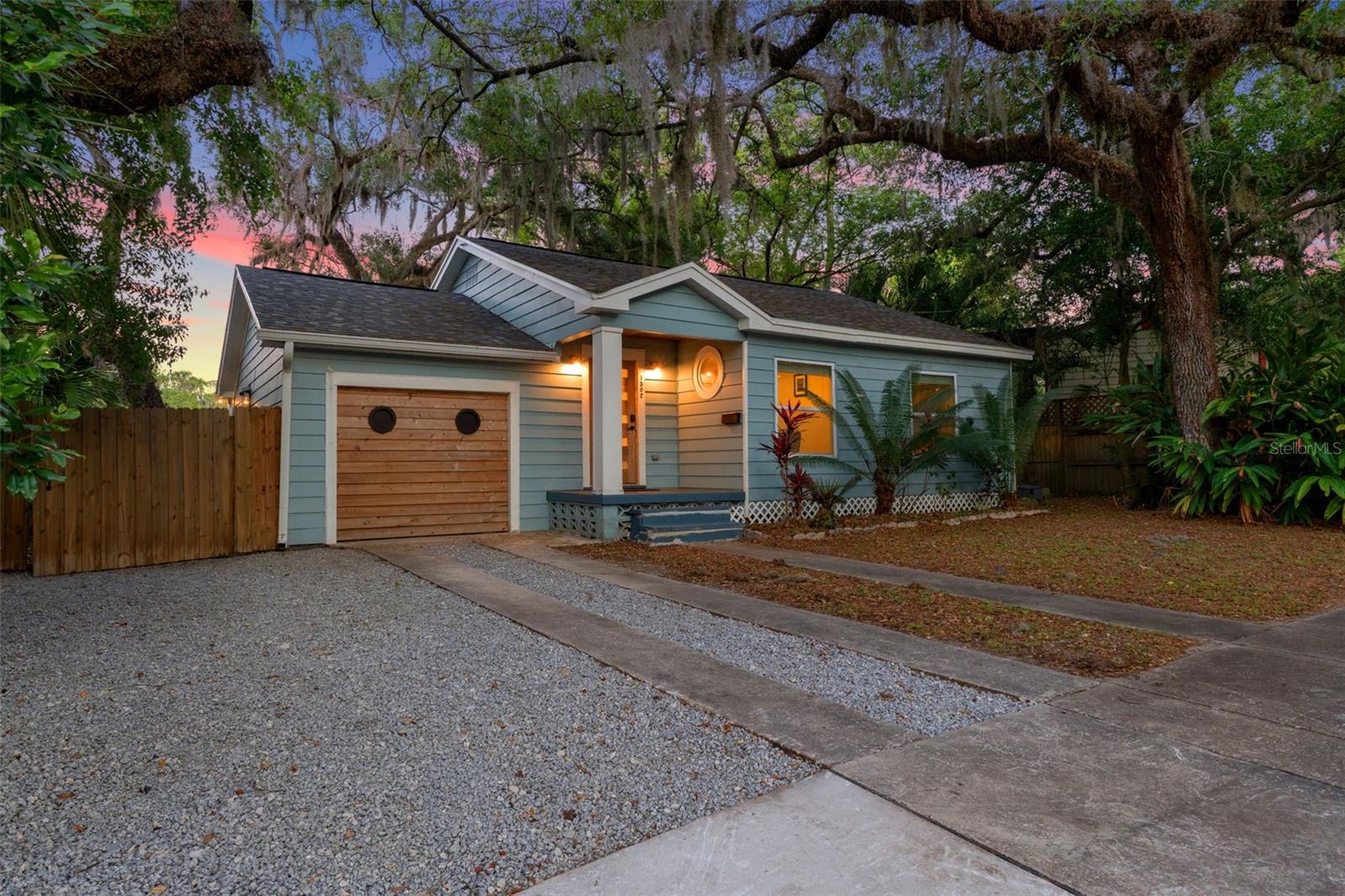 Experience what many call "one of the most beautiful views in Florida." This rare opportunity is one of only 10 properties situated directly on Hanna’s Whirl, a pristine open bayou on the Hillsborough River. Nestled in a serene stretch of Seminole Heights, this home offers an unparalleled blend of adventure, tranquility, and modern luxury.This refinished 3-bedroom, 3-bathroom midcentury residence is elevated HIGH AND DRY above the riverbank, offering you complete peace of mind. The home has been thoughtfully modernized throughout, featuring rich flooring that flows seamlessly underfoot. Bathed in natural light thanks to its ideal eastern exposure, the open-concept layout includes two primary suites, both boasting gorgeous ensuite bathrooms and stunning water views. The third bedroom is perfectly versatile, serving as an ideal guest suite or a quiet home office. No expense was spared in the renovation of the chef’s kitchen, which features a massive stone center island that serves as the heart of the home, complemented by custom cabinetry, charming bonus nooks, and a tasteful nautical theme that runs throughout the living spaces.Whether you are an avid boater or a nature enthusiast, this property is your private gateway to the water. With 91 feet of direct riverfront, you can launch your boat from your private dock and enjoy easy navigation to downtown Tampa’s hotspots, or paddle upstream to explore the wilder reaches of the calming Hillsborough River. The backyard is a true oasis, featuring a massive rear deck and an expansive paver patio area perfect for entertaining. As a natural manatee habitat, this serene setting allows you to enjoy regular sightings of osprey, tarpon, and gentle manatees right from your own backyard, where you can also cast a line for top-quality fishing. The property is fully fenced for privacy and includes extra parking space.This is more than just a home; it is an adventurer’s sanctuary available to you now.
