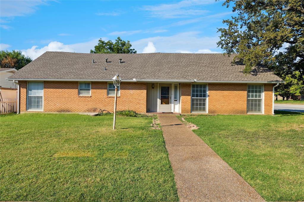Great curb appeal to this spacious home in Southwest Hills. Upon entering the home you will notice the brick flooring and formal living room or study to the right. The hallway to your left will lead you to the primary bedroom with an ensuite bath and two secondary bedrooms and secondary bath across the hallway. The stairs across from secondary bath will lead you to a bonus room or 4th bedroom with hardwood floors, walk-in closet and wall of windows overlooking backyard.  Eat in kitchen with many cabinets and lots of countertops also a pantry,freestanding stove.  Converted garage on back of home makes a great size family room with ceramic tile floors and two fans. Substantial steel carport on the back of home.