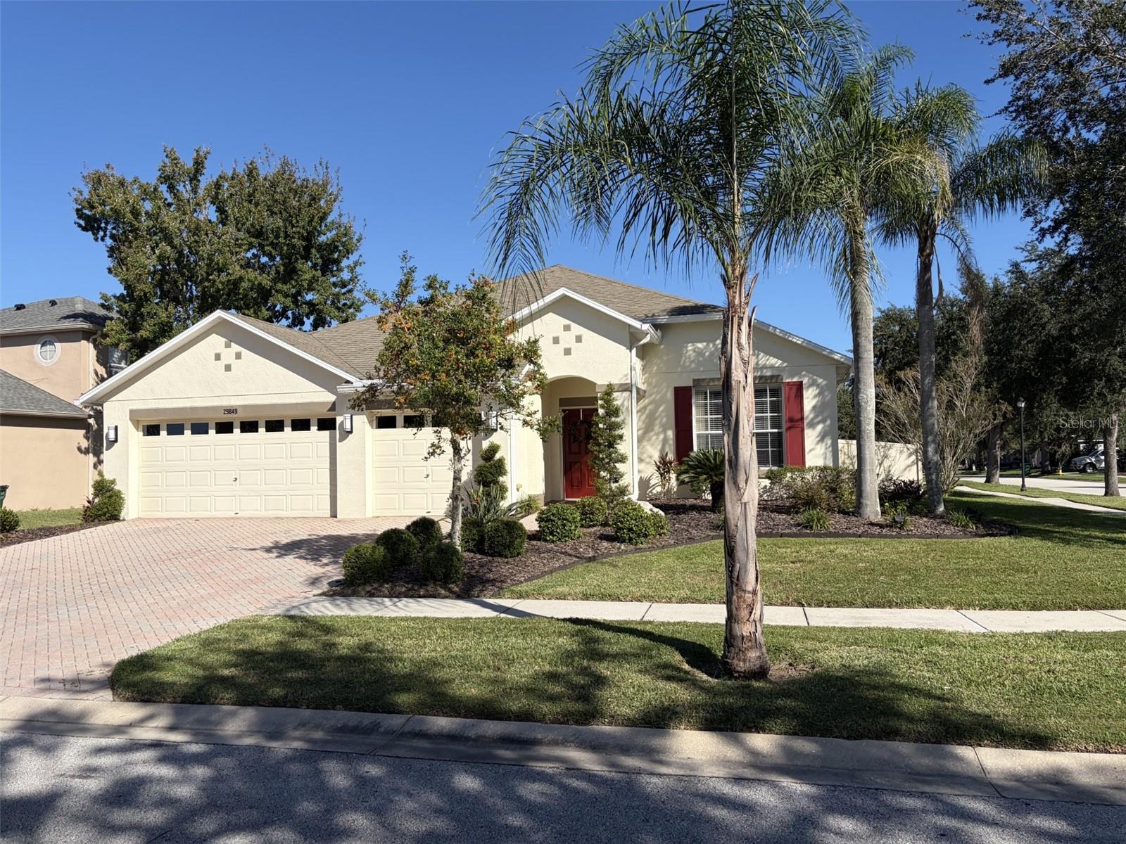 Welcome to 29849 Boyette Oaks Place, Wesley Chapel! This beautifully updated 4-bedroom, 2-bathroom home features over $80,000 in recent upgrades, offering modern style, comfort, and move-in-ready appeal. Enjoy new vinyl flooring throughout, a stunning remodeled kitchen with shaker cabinets and elegant waterfall quartz countertops, and fresh interior and exterior paint. Thoughtful upgrades include updated fixtures, enhanced closet organization, a vinyl privacy fence, and a refreshed flower bed for added curb appeal. Major improvements include a new AC system installed in 2025 and a whole-house water filtration system for added comfort and convenience. With its stylish finishes and extensive improvements, this home is ready for its next owner to move in and enjoy. Don't miss the opportunity to make this beautifully refreshed property your own!