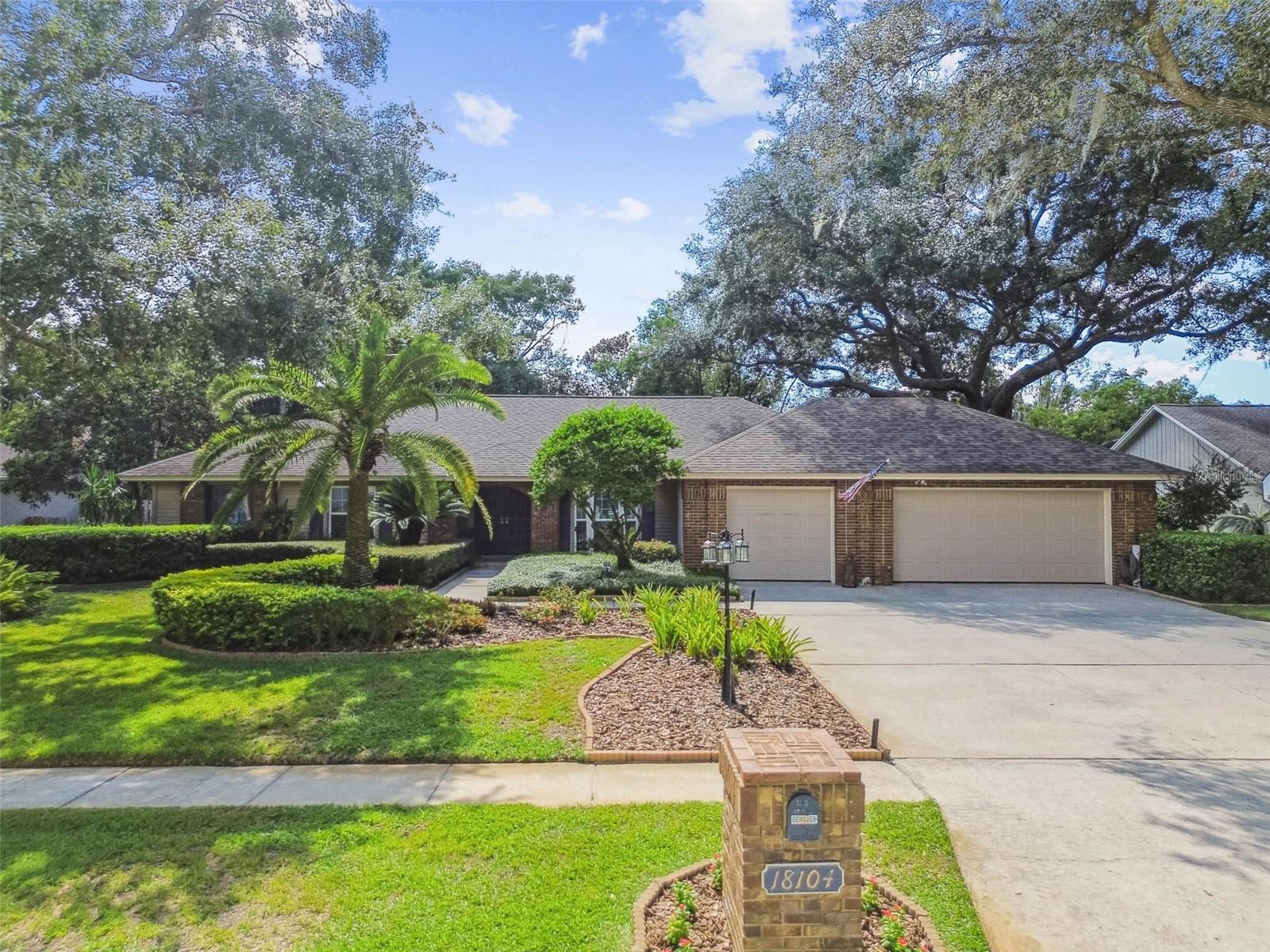 Under contract-accepting backup offers. Step into a world where comfort, elegance, and Florida living come together in perfect harmony. This original-owner gem offers 4 generously sized bedrooms, 3 thoughtfully updated bathrooms, and a versatile 110 sq. ft. bonus flex room (not included in square footage) that’s ideal for a serene home office, fitness retreat, craft studio, or cozy guest space. From the moment you arrive, you're greeted by undeniable charm and curb appeal. Lush, freshly manicured landscaping, a welcoming lamppost, pressure-washed surfaces, and tastefully placed exterior lighting set the stage for the warmth and sophistication found inside. Subtle security flood lighting adds both beauty and peace of mind. Inside, the home exudes timeless appeal with Brazilian Cherry hardwood floors gracing select living areas, while the heart of the home—its stunning kitchen—delivers both function and flair. Featuring rich dark wood cabinetry, granite countertops, and sleek stainless steel appliances, this space is designed to inspire culinary creativity and casual gatherings alike. Each bathroom has been thoughtfully updated with tasteful vanities, designer mirrors, and on-trend lighting, creating spa-like sanctuaries throughout. Every corner of this home has been enhanced to reflect warmth, comfort, and practical elegance. Step outside into your very own backyard paradise—a spacious, private retreat that invites relaxation and celebration. Surrounded by mature landscaping and fruit trees, the saltwater pool sparkles under the sun, enclosed by brick pavers and a screened enclosure (2019) for all-season enjoyment. The fully equipped outdoor kitchen transforms everyday meals into alfresco feasts, perfect for entertaining under the stars. Whether you're hosting lively pool parties or enjoying peaceful morning coffee, this backyard is a true sanctuary. This home is more than just beautiful—it's exceptionally well-maintained, with recent upgrades that ensure peace of mind, including: Hurricane-rated windows throughout most of the home, Additional features include a spacious 2-car garage with additional dedicated garage space for workshop or motorcycle/golf cart flex area, a large laundry room with built-in cabinetry, abundant storage, modern lighting with dimmers, and a 7-zone irrigation system to keep the landscaping thriving. Residents of The Manors at Crystal Lakes can enjoy this highly coveted neighborhood behind 24-hour guard gated entrance. With access to tennis/pickleball courts, a clubhouse, a playground, and a strong sense of community brought to life by year-round neighborhood events and gatherings. Zoned for Steinbrenner High School and close to top-rated charter schools, this location offers a rare blend of privacy, prestige, and proximity—just a short drive to Tampa’s amenities and the white-sand beaches of the Gulf Coast. Homes of this caliber rarely come available—schedule your private showing today and experience the lifestyle you’ve been waiting for. This is more than a house—it’s a place where memories are made, where every corner tells a story of care, love, and pride. A rare find that blends quality, character, and an exceptional Florida lifestyle.