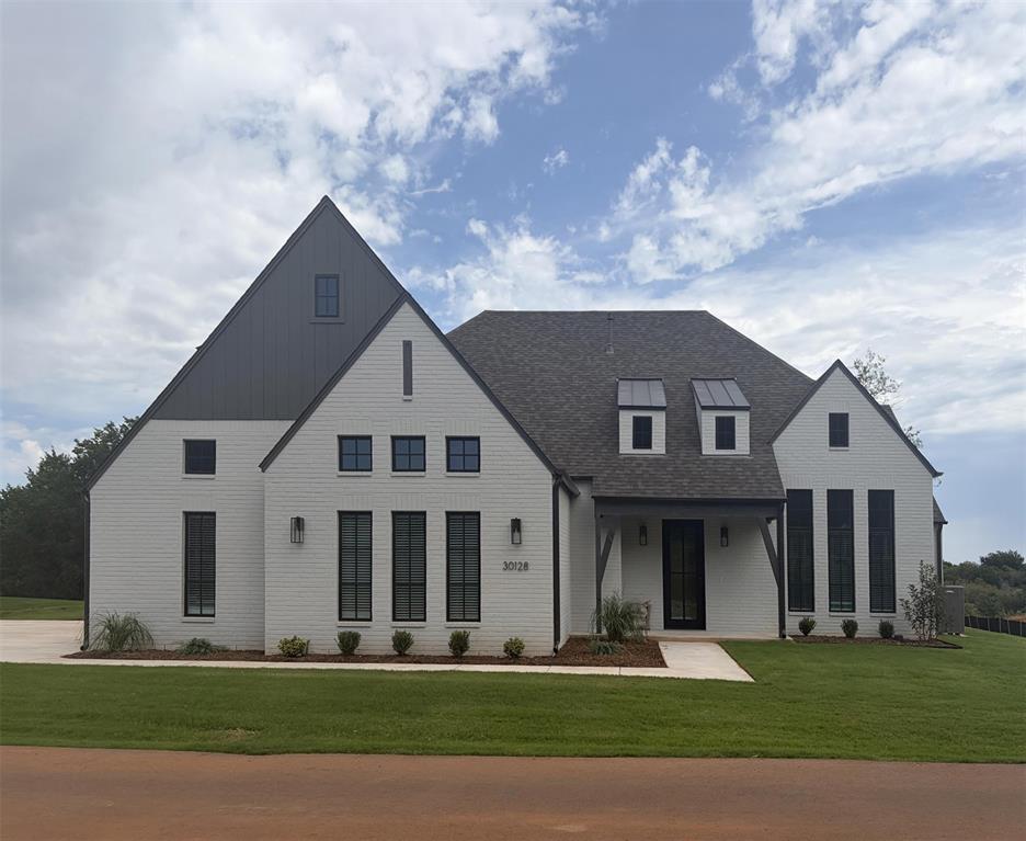3519 Multi-Gen Plan || New STRAIGHT style exterior || TRANSITIONAL interior finishes. EXECUTIVE QUALITY. READY NOW! With over 2,500+ on-time closings and counting, our turnkey experience guarantees exceptional quality at an unbeatable value. Our commitment to quality includes completing 1,200+ checklist items during construction, 100+ hours of detailed punch out prior to closing, and experienced warranty service after closing.