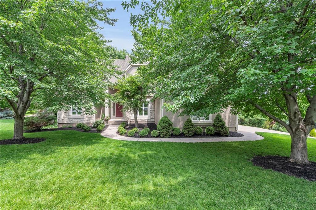 Nestled in the prestigious Riss Lake community of Parkville, this stunning home offers the perfect blend of refined living and natural serenity. Surrounded by mature trees, rolling hills, and scenic lake views, this property invites you to unwind in one of Kansas City’s most beautiful and peaceful settings.

Step inside to discover a meticulously maintained home filled with warmth, light, and thoughtful design. From the soaring ceilings and expansive windows that bring the outdoors in, to the elegant finishes and custom touches throughout, every detail speaks of timeless quality. The spacious kitchen, ideal for entertaining, opens to a cozy hearth room and a private deck that feels like your own treehouse retreat. Enjoy the sights and sounds of the diverse song birds, geese, cardinals, and bald eagles that also share Riss Lake. 

The primary suite is a sanctuary of comfort with lush views and a spa-like bath. The unfinished walk-out lower level offers potential for additional living space or rec space, perfect for billiards and game night--the pool table stays with this home!

Living in Riss Lake means more than just a beautiful home—it’s a lifestyle. Enjoy access to three neighborhood pools, tennis courts, miles of walking trails, a private lake with an undeveloped shoreline, marina for kayaking and fishing, and a vibrant, welcoming community. The lake is stocked with Missouri sporting fish and is perfect for fishing and boating. Residents use various watercraft including electric-powered pontoon and fishing boats, kayaks, canoes, and sailboats to enjoy over a dozen species of fish. All just minutes from historic downtown Parkville, top-rated schools, and convenient highway access. 

Whether you're sipping coffee on the deck as deer and other wildlife wander by, or hosting family and friends in the heart of your gorgeous home, 5733 North Pointe Terrace offers a life of peace, connection, and everyday luxury.