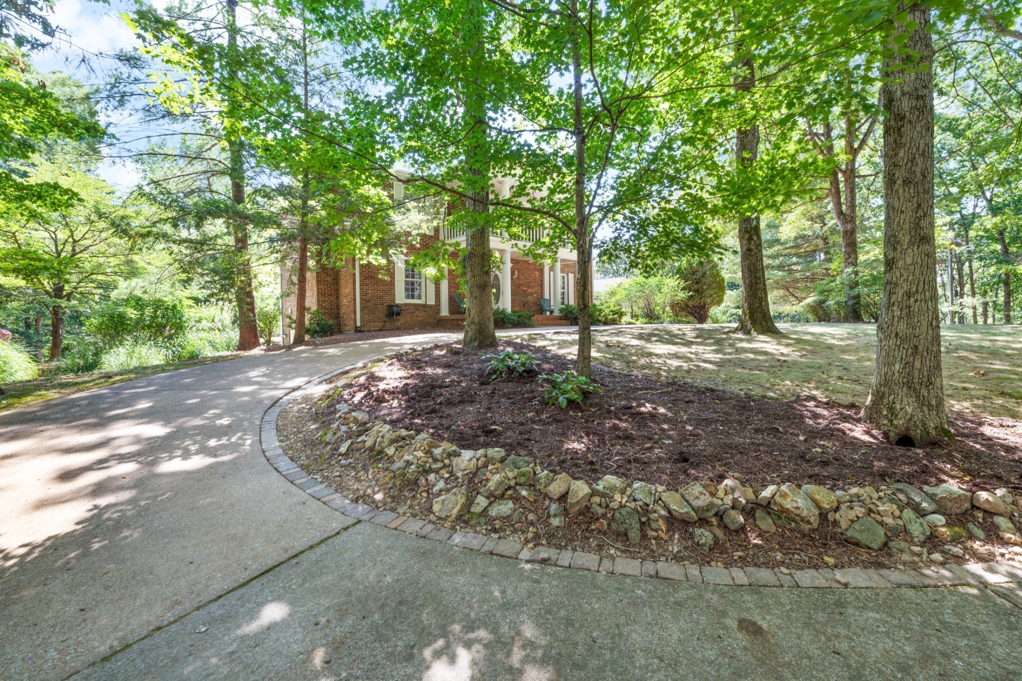 Private 104-acre Tennessee retreat offering the perfect blend of recreation, farming, and peaceful country living! Rolling hills, mature timber, open pasture, a stocked pond, abundant deer and turkey, and an impressive 16x16 elevated hunting cabin make this property truly one of a kind. A picturesque entrance and long concrete drive lead to a timeless home tucked away in complete privacy. Inside you'll find hardwood floors, fresh paint, a grand staircase, 3 fireplaces, custom built-ins, granite countertops, newer appliances, and a formal dining room with fireplace. Relax on the spacious covered porches overlooking this beautiful property. New roof in 2025! Additional features include a detached 2-car garage, whole-house generator, Apollo 100-gallon water tank, MLConnect Fiber Internet, and a partially finished basement with workshop, gun room, hobby room, full bath, and abundant storage. Whether you're looking for a forever home, hunting retreat, working farm, or legacy property, this rare offering is full of opportunity. Seller will consider selling the home with approximately 5-15 acres separately.