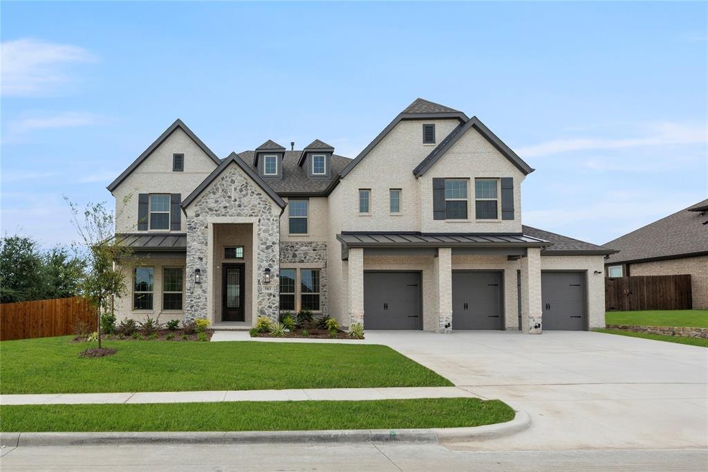 MLS# 20972812 - Built by First Texas Homes - Ready Now! ~  Located in Woodcreek, Fate, TX, this thoughtfully designed home offers 5 bedrooms, 4 bathrooms, and 4002 sq ft of flexible living space that’s built for real life. Whether you're gathering with loved ones or enjoying a quiet moment, this home gives you the space — and comfort — to do both. Inside, you’ll find features like a stunning elevation with a front porch and a three-car garage located on a corner homesite. Inside, a dramatic curved staircase, and an 18' flat-ceiling family room with double stacked windows create a grand feel. The gourmet kitchen boasts stainless steel appliances, double wall ovens, and an expansive island; upstairs, a media room includes a wet bar, designed to make everyday living easier and more enjoyable. With close access to I-30 for easy commutes to Downtown Dallas and Rockwall, with access to shopping, dining, and Lake Ray Hubbard adventures, you’ll enjoy the convenience of everything you need—without giving up the peace of coming home. If you’re looking for a home that fits your life, we’d love to show you around.