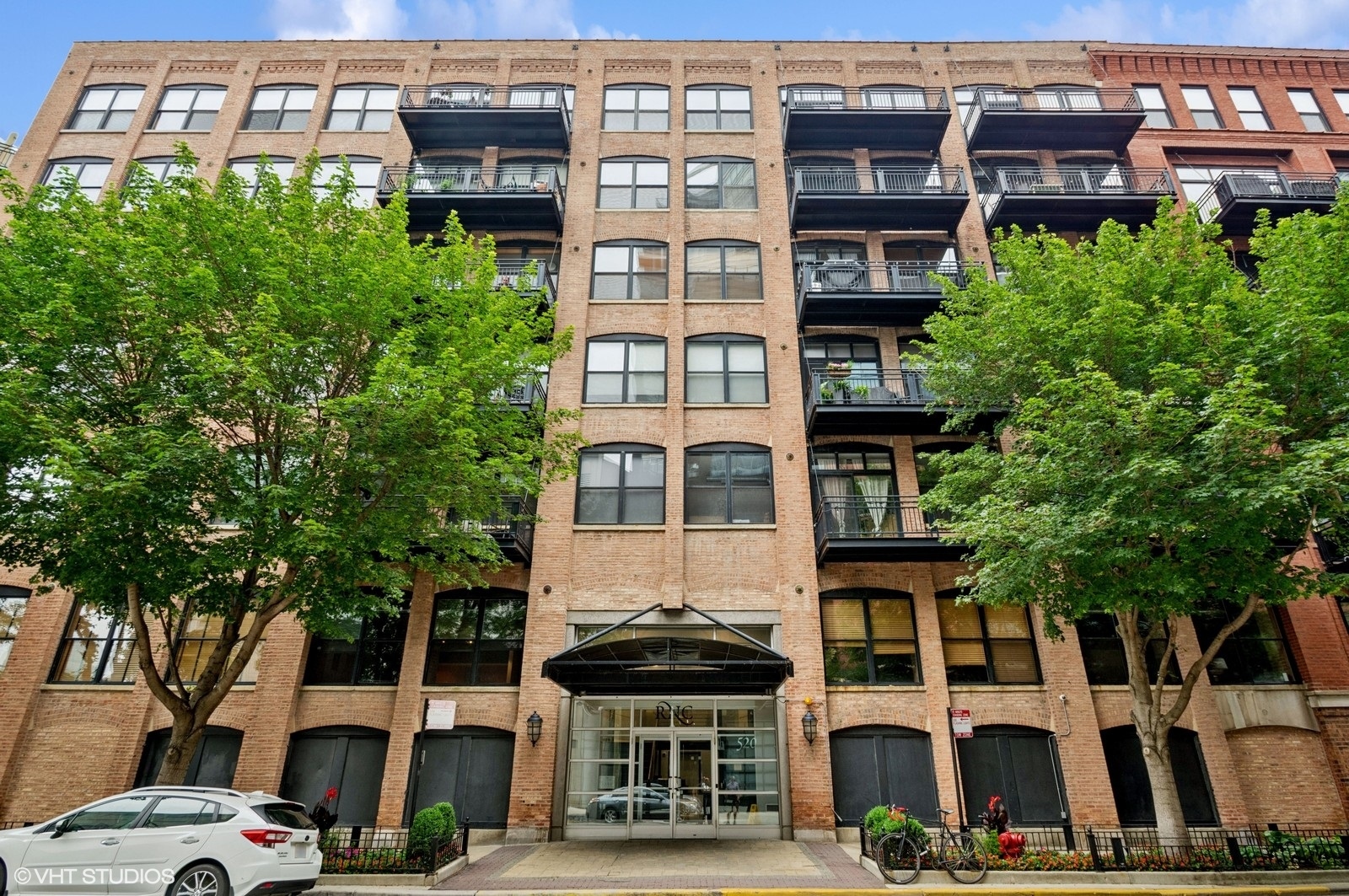 Renovated and rare 2BD/2BA first-floor unit in the heart of River North with private entrance and spacious outdoor patio! This beautifully updated home features hardwood floors, high timber lofted ceilings, and an open layout perfect for modern living. The kitchen offers sleek cabinetry, and stainless steel Miele appliances. The primary suite includes a large walk-in closet and a fully updated en-suite bath. Generously sized second bedroom and full guest bath. In-unit laundry. Enjoy your own private entryway for added convenience and privacy-ideal for pet owners or those who love indoor-outdoor living. Full-amenity building with 24-hour door staff, fitness center, dry cleaners, bike storage, and more. Unbeatable location near restaurants, shopping, transit, parks, and the riverwalk. Heated garage parking available for $30,000. A unique opportunity in a highly desirable building!