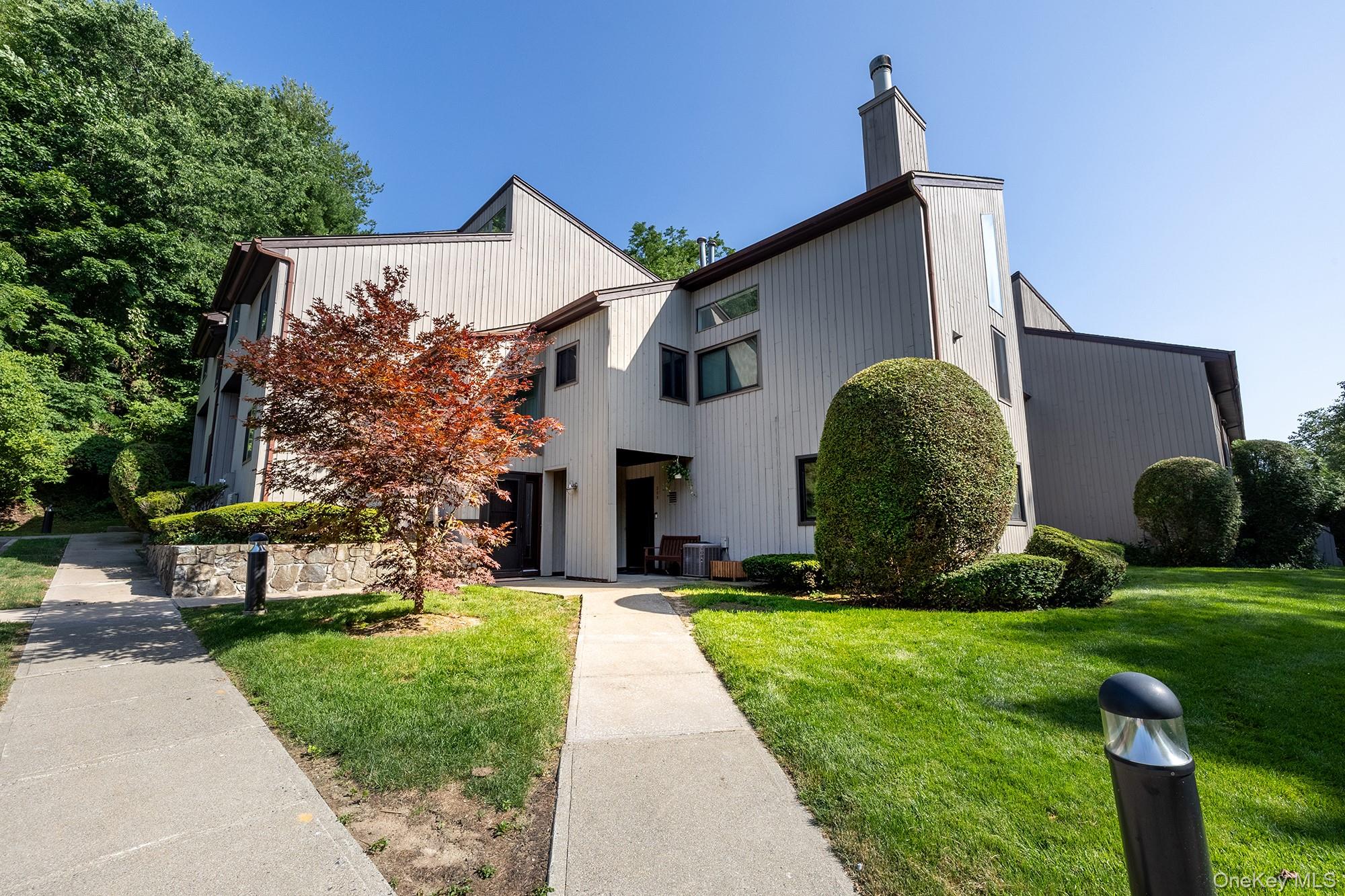 Welcome to 309 N. Greeley Avenue. This lovely first floor Town House in the sought-after Chestnut Oaks Community is conveniently located to the heart of downtown Chappaqua. With the award-winning Chappaqua School District and proximity to a Metro North station, this property will not last! This Two Bed, 1 Bath unit has a great layout with a front and back patio! There are no stairs (just one step-down to a sunken Living Room)....enter into this unit and all rooms are one the same level! The main living room is both open and airy with a high ceiling, fireplace and two sliding glass doors leading out to lovely patios and open space. The complex features a swimming pool, tennis and a garden. Make your appointment today!