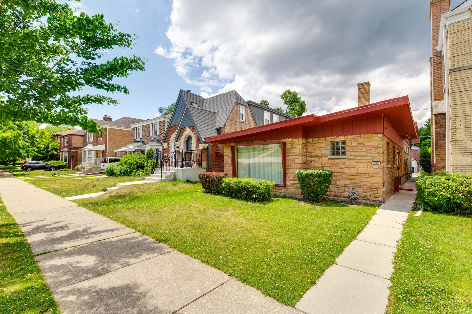 Welcome to this beautifully maintained 4-bedroom, 2-bath home located in the desirable North Park neighborhood of Chicago! This charming residence features gleaming hardwood floors, a bright and inviting sunroom, and a fully finished English basement offering excellent additional living space. The seller has completed numerous updates, including fresh interior paint, roof sealing, a renovated bathroom, and newer kitchen appliances-refrigerator, stove, and updated venting systems in both bathrooms. Since moving in, the seller also installed hardwood floors upstairs, replaced all windows throughout the home, and added a new sump pump for peace of mind. The AC and furnace have also been replaced. The spacious basement provides ample storage space-perfect for organizing your essentials or creating a workshop or rec area. A detached 2-car garage completes this move-in-ready home. Conveniently located near parks, schools, shopping, and public transit-this one is a must-see! SOLD AS IS.