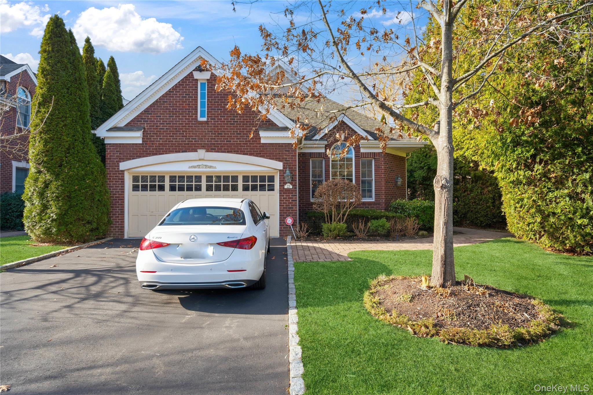 The Chatham at Manhasset - Premier Gated Luxury LivingExperience refined elegance in this exquisitely updated end unit residence, offering 5 bedrooms and 4.5 bathrooms, soaring ceilings throughout, and uninterrupted pond views that create a serene, resort like ambiance. A dramatic two story foyer sets the stage, leading to an impressive formal living room with 15 foot vaulted ceilings and a sophisticated dining room designed for both intimate entertaining and grand gatherings. The gourmet chef’s kitchen boasts exceptional flow into the sun filled family room, where a gas fireplace and French doors open to a private deck overlooking the pond, an idyllic setting for al fresco relaxation. The main level is further enhanced by a luxurious primary suite with direct deck access, along with a private guest ensuite for optimal comfort. Upstairs, three generously scaled bedrooms and two beautifully appointed full bathrooms provide ample space for family or guests. Additional highlights include a walkout full lower level. Residents of The Chatham enjoy an unparalleled lifestyle with exclusive access to a grand clubhouse, indoor and outdoor pools, fitness center, tennis courts, an outdoor basketball court and a playground. Perfectly positioned near major highways, renowned hospitals and world class shopping and dining. Herricks Schools.