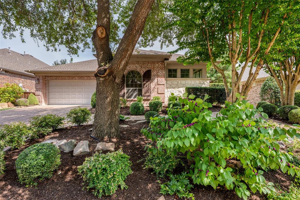 Let the golf cart paths welcome you to this refined single-story patio home in the Villas of Tanglewood at Stonebridge Ranch, designed with comfort, style, and low-maintenance living in mind. This residence combines timeless architectural details with thoughtful updates, all within one of McKinney’s most desirable communities. The interior showcases a mix of hardwood, tile, and carpet flooring, plantation shutters, double crown molding, smart floorplan and elegant lighting. A well-appointed kitchen features granite countertops, gas cooktop, under-cabinet lighting and breakfast bar. A formal dining room sits adjacent to the open floorplan, making it perfect for entertaining. The adjoining family room centers around a fireplace with custom mantel and built-in cabinetry, creating a warm and inviting space for gatherings. The private primary suite offers crown molding, access to the patio, and a spacious bath with dual vanities and walk-in closet. A dedicated study provides flexibility for work, reading, or hobbies. The home’s design emphasizes ease of movement and a thoughtful layout, perfectly suited for a downsizing buyer who desires quality without excess upkeep. One of the standout features is the added screened-in porch, extending the living space and allowing year-round enjoyment of the outdoors. The three-car garage includes staircase access to a spacious floored attic, an inset area ideal for a workbench, and storage closet. Tons of storage! Surrounded by larger estate properties, this home offers prestige in address while maintaining a manageable footprint. The zero-lot-line design ensures minimal yard maintenance while preserving a sense of privacy. Located within Stonebridge Ranch, residents enjoy walking trails & access to resort-style amenities including swimming, tennis, pickleball, lakes & community events. This McKinney patio home blends elegance, convenience & location just minutes from shopping & dining in Adriatica and the historic downtown.