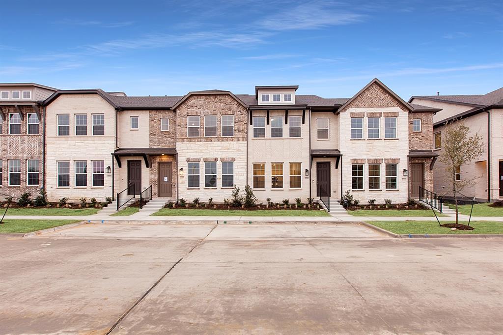Nearly new - Ashton Woods home minutes from highway. Allen ISD. Townhome is full of charm with an all-brick exterior, awning above the front door and second floor windows, and wood accent corbels! Feel inspired to entertain in this beautiful artisan essential collection home designed with upscale finishes and open floorplan. Shaw wood vinyl plank flooring flows throughout the entire first floor. The kitchen offers an eat-in island, Energy Star Whirlpool stainless steel appliances, undermount sink, bianco serena Quartz solid surface countertops, black pendant lights, pure white 42 inch shaker cabinets, a storage pantry, matte black Moen faucet, and mosaic ceramic tile backsplash. All bedrooms, a loft, secondary bathroom, and a utility room make up the second floor. A spacious primary suite opens to a bathroom designed with a double sink vanity, ceramic tile shower with glass enclosure, ceramic tile flooring and a walk-in closet!