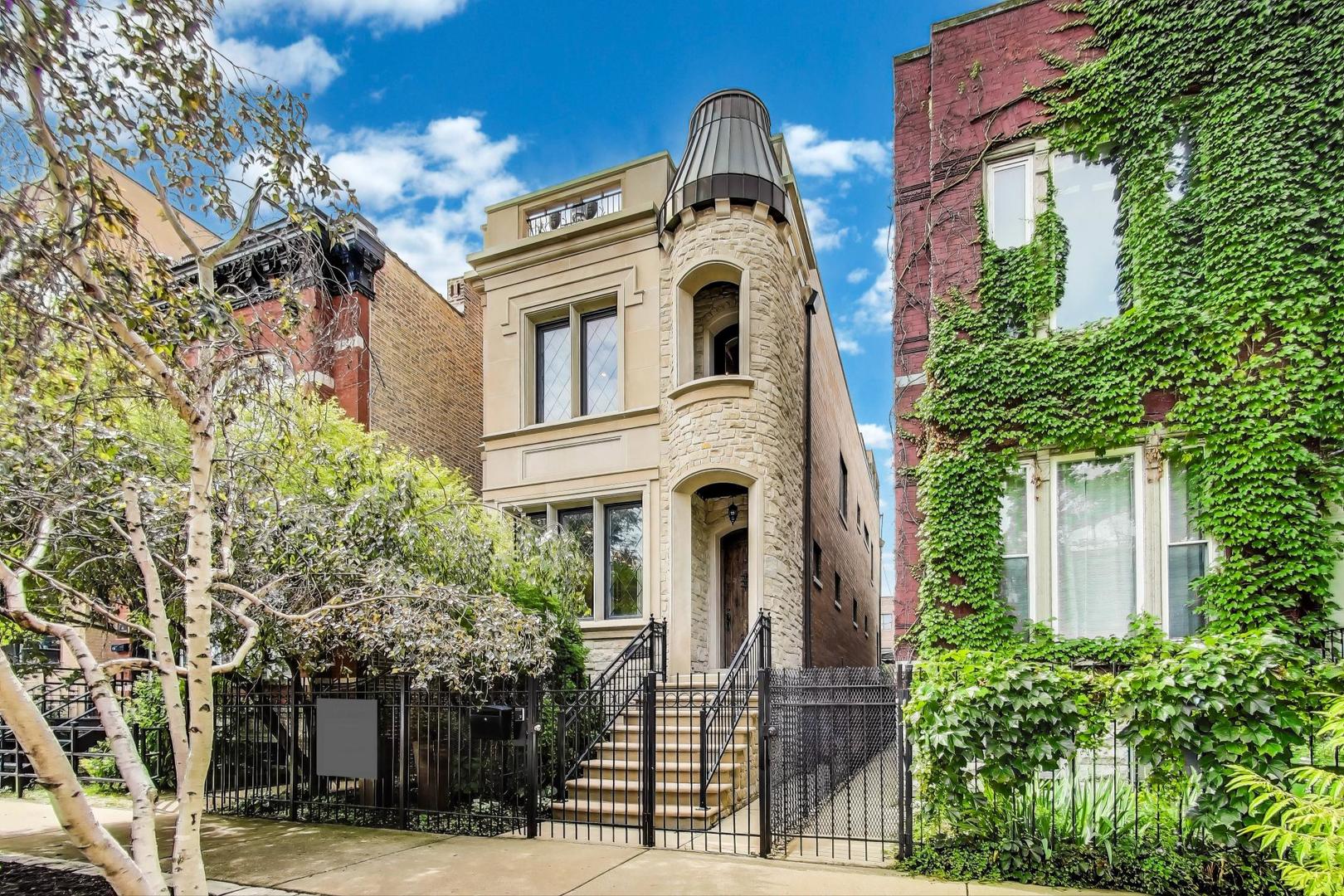 Striking 4-Bedroom Home with Four Private Outdoor Spaces in Ukrainian Village!! This stunning, architecturally distinctive single-family home in the heart of Ukrainian Village offers thoughtful design, expansive living areas, and four unique outdoor spaces that truly elevate city living. Step through a beautifully landscaped front garden and into an open, airy layout featuring dramatic ceiling height and tall, solid-core doors. The main level flows effortlessly from a welcoming living and dining space into a chef-inspired kitchen with oversized island, wet bar, and generous pantry. The back patio creates an easy extension of the living area - ideal for grilling or relaxing.    Upstairs, the serene primary suite includes a spa-style bath and abundant natural light. A private rear deck off this oasis provides a quiet escape.  The rooftop deck crowns the home, with sweeping city views, integrated planters, lighting, and room to lounge or gather around a fire table under the stars or watch the game.    The lower level features radiant floors, a large family room, full bathroom, laundry, and a fourth bedroom perfect for guests, a home gym, or office. A new garage rooftop deck offers even more room to unwind, entertain, or garden. Ample storage and a two-car garage round out the convenience and comfort of this home.    Located on a quiet, tree-lined block just steps from Chicago Ave shops, dining, and transit, this home blends elegant city living with comfort, space, and style - both indoors and out.
