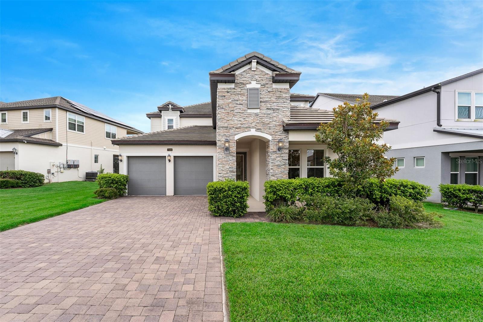 AMAZING LAKEFRONT LUXURY IN THE HEART OF DR. PHILLIPSWelcome to an unparalleled statement of waterfront sophistication. Nestled within the ultra-exclusive, securely gated enclave of Sand Lake Sound, this breathtaking single-family masterpiece redefines modern lakeside living. Positioned perfectly with a southeast-facing backyard and a south-facing main living arena, the estate enjoys an abundance of natural sunlight, bathing its seamlessly designed, ultra-bright, and airy interiors in a radiant glow.With over $130,000 in meticulous premium upgrades curated by its original owner, this 5-bedroom plus office, 3.5-bathroom sanctuary offers an architectural layout where nearly every primary living space captures the majestic, sparkling expanse of Big Sand Lake.The heart of the home is a culinary masterpiece. It features upgraded custom cabinetry extending fully to the ceiling, pristine quartz countertops, an expansive center island, and a brand-new chef's refrigerator. The kitchen flows naturally into a panoramic breakfast area, looking out to stunning water vistas. The entire main floor is anchored by elegant tile flooring paired with integrated, premium surround-sound speakers that flow effortlessly from the dining spaces out to the covered patio.THE FIRST-FLOOR PRIMARY RETREATDesigned as a private boutique sanctuary, the luxurious main-level primary suite allows you to wake up to direct, peaceful lake views right from your bed. The spa-inspired en-suite features dual vanities, a deep standalone soaking tub for ultimate rejuvenation, a separate custom shower, and an oversized, walk-in showroom closet.THE SECOND-LEVEL SUNSET VIEWING TERRACEAscend to the second level—featuring upgraded premium Luxury Vinyl Plank flooring and ceiling fans in every bedroom—to discover the home’s crowning jewel. A spacious balcony spans the upper level, offering SPECTACULAR, UNINTERRUPTED VIEWS OF BIG SAND LAKE. This vantage point serves as your private front-row seat to witness awe-inspiring, world-class Florida sunsets transforming the sky into a golden canvas every single evening.LAKE LIFESTYLERare Motorized Lake Access: Fully permitted for motor boats—perfect for wakeboarding, water skiing, and fast-paced aquatic luxury.Build Your Dream Dock: This premier lot allows for a private boat dock to be built, giving you direct, private water entry from your own backyard.RESORT-STYLE AMENITIES & UNRIVALED LOCATIONStep outside into your backyard to enjoy DIRECT ACCESS TO BIG SAND LAKE for water activities, or indulge in Sand Lake Sound’s resort-style amenities, including a panoramic community pool, splash pad, playground, and community dock.Perfectly situated in the absolute center of Dr. Phillips, you are just 5 minutes from the world-famous "Restaurant Row," and mere minutes from International Drive, elite golf courses, and world-class theme parks. This is not just a home; it is an irreplaceable lifestyle asset. Schedule your tour today.