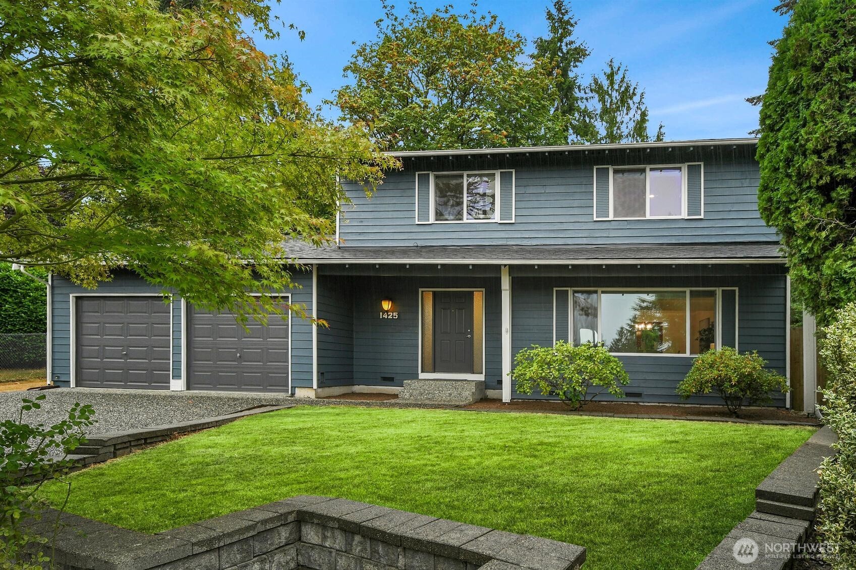 Set at the end of a cul-de-sac in the coveted Lockmore neighborhood, this amazing two-story home opens with hardwood floors, a refreshed kitchen with new countertops, and a sunlit eat-in nook whose French doors spill into the backyard. Fresh paint, plush new carpet, dual-pane windows, central A/C, and forced-air heat keep the spaces bright and comfortable. A formal dining room and dedicated laundry/mudroom add everyday ease. Downstairs offers two distinct living areas: a living room anchored by a wood-burning fireplace and a family room with its own French doors to the patio, ready as a home office or media room. French doors throughout make indoor-outdoor living effortless. The primary suite features a dual-sink vanity, jetted soaking tub, separate shower, and a walk-in closet large enough to feel like its own room, plus a second full bath and a guest half bath. Outside, a level, fully fenced backyard offers garden space, territorial views, and a generous deck tucked against mature trees. Attached 2-car garage. Pre-inspected and move-in ready!