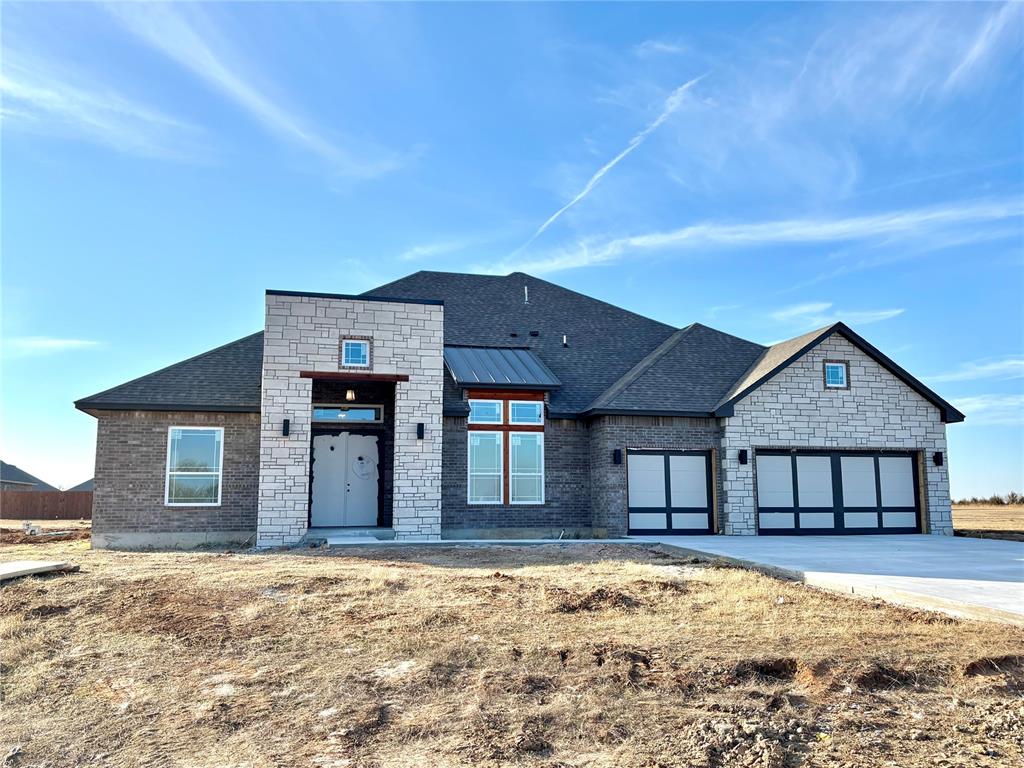 Step into a home that doesn't just check boxes—it steals your heart. 4027 Blue Ridge Avenue isn’t just a house; it’s the space where your story begins. From the double-door entry to the soaring ceilings and stunning architectural touches, every inch radiates warmth, elegance, and soul. Imagine family gatherings around the fireplace, sunlight pouring over custom-built shelves in your private study, and laughter echoing through an open kitchen built to inspire. With quartz countertops, Samsung built-ins, farmhouse sink, and a massive walk-in pantry, this kitchen isn’t just functional—it’s unforgettable. Retreat to a spa-like primary suite with a soaking tub under vaulted ceilings, a designer doorless shower, and a closet you could dance in. The connected utility room adds effortless flow to your daily life. Outside, the covered patio stretches across nearly 1/2 (mol) of an acre, set in a peaceful community Closing costs covered with our preferred lender. Don’t miss your chance to reserve this dream before someone else claims it. Easy access to HWY 9, I-35, and OKC hot spots. Serenity meets convenience. This home speaks to the heart and moves fast.
