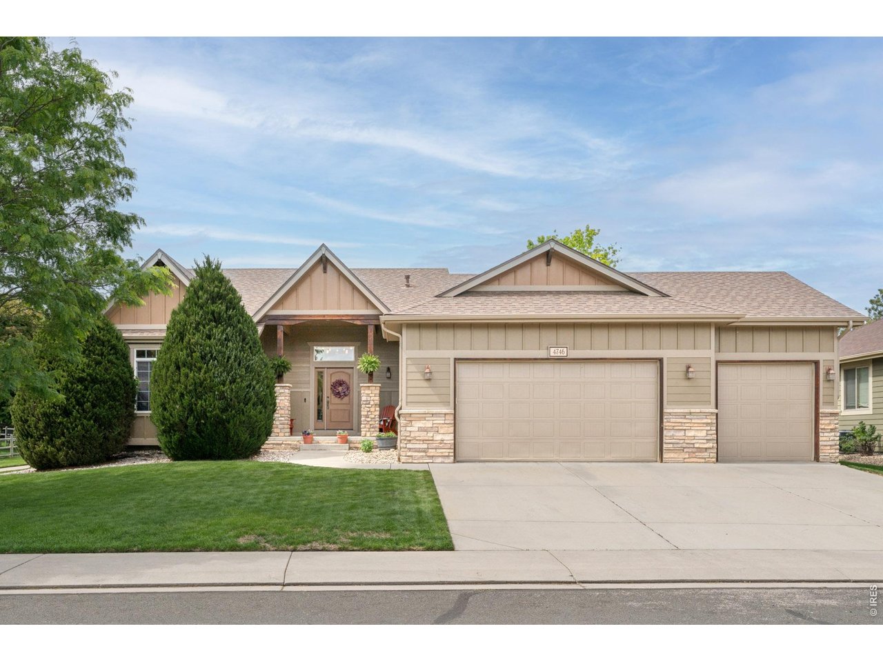 Situated within Clydesdale Park on a generous lot, this custom-finished ranch embodies the quintessential Colorado lifestyle with effortless elegance. A covered front porch leads into an inviting living area where a tiled fireplace and custom built-ins anchor the space with warmth and character. The open dining area flows into a large kitchen appointed with generous cabinetry and stainless steel appliances. The primary suite offers a private en-suite bath with dual vanity, while versatile secondary bedrooms accommodate guests or a dedicated home office with equal ease. A newly finished basement elevates the home further, delivering a recreation room and custom bar that redefine at-home entertaining. Outside, an extended patio backs to open space, complemented by a lush lawn. Enjoy the neighborhood's extensive trail system with four ponds and a park. An updated laundry and mud room with a utility sink and a three-car attached garage round out this inviting haven - all just moments from Downtown Fort Collins.