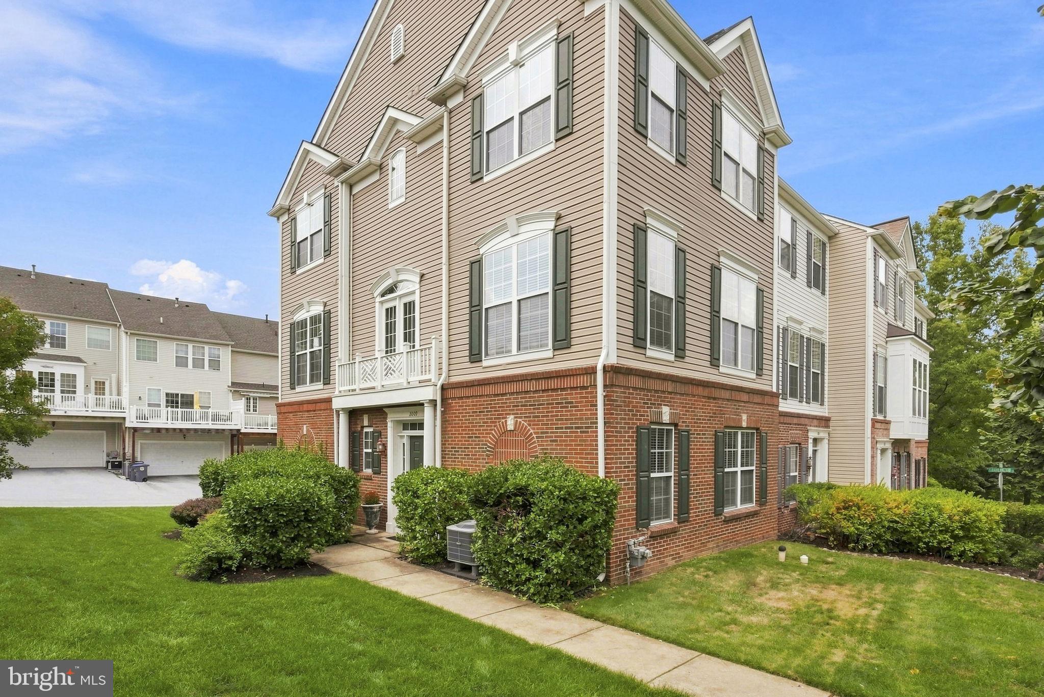 Fabulous end-unit townhome in the desirable Windsor Ridge community, perfectly positioned overlooking peaceful open space! This beautifully maintained home offers three levels of bright and airy living space, a 2-car garage, and plenty of room for both everyday living and entertaining.The entry level welcomes you with hardwood flooring,  two coat closets, and convenient access to the 2-car garage.  A versatile family room provides the perfect space for a home office, playroom, or additional living area. The utility room, complete with washer and dryer, is also located on this level.The main level features a convenient powder room, spacious Living and Dining Rooms with hardwood flooring, and a bright, well-appointed Kitchen featuring 42-inch cabinetry, a center island, hardwood floors, and a sunny breakfast area with ceiling fan. Upstairs on the third floor,  you will notice the hardwood flooring thoughout. The Primary Suite offers a walk-in closet and private en-suite bath with a soaking tub, separate shower stall, and double-bowl vanity. Two additional bedrooms and a tiled hall bath with a shower/tub combination complete the upper level.For added peace of mind, the seller installed a New  hot water heater in 2024 and is offering a **one-year home warranty**.Windsor Ridge offers an exceptional array of amenities, including walking trails, a clubhouse, swimming pool, playgrounds, and tennis courts. Conveniently located near major routes, shopping, restaurants, and everyday conveniences, this home offers the perfect combination of comfort, community, and location!