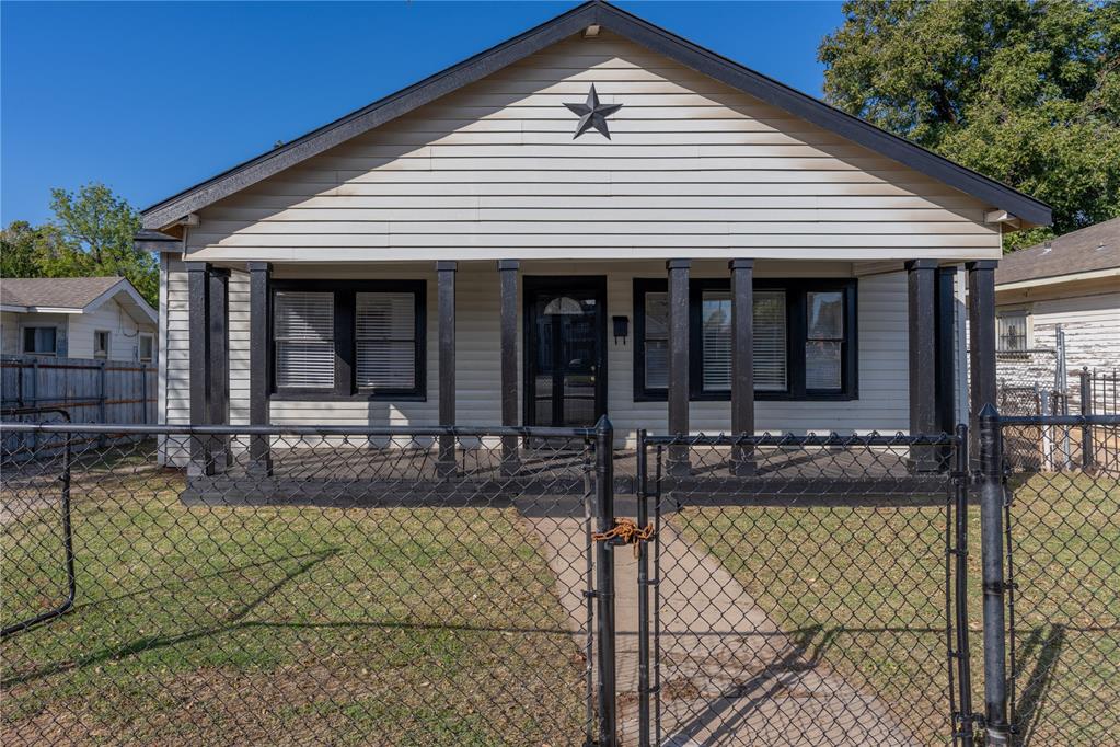 Conveniently located just minutes from Downtown OKC, local dining, and major highway access, this cute 3-bedroom, 2-bathroom home offers move-in-ready comfort and classic appeal. Warm wood flooring runs throughout the entire layout, leading into a cozy living area anchored by a brick fireplace with built-in shelving. Outdoors, enjoy a welcoming covered front porch and easy access to a fully fenced backyard perfect for pets, play, or relaxing—plus, central A/C can easily be added to the price if requested by the buyer. Reach out today to schedule your private tour!