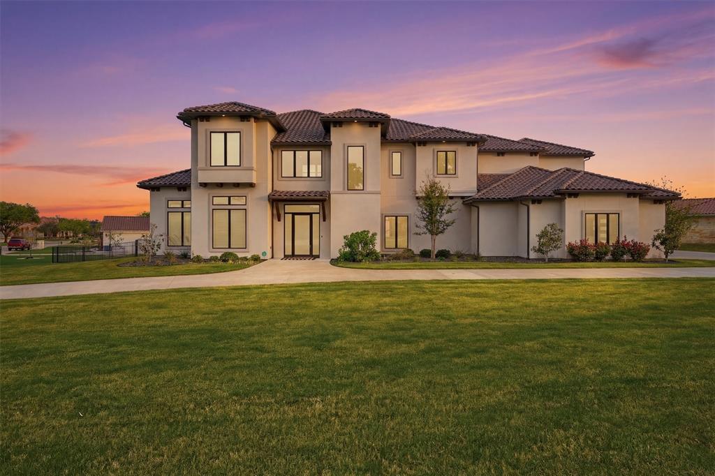 Experience elevated lakefront living in this exceptional 5-bedroom, 7-bath estate located in the prestigious Catalina Bay community on Lake Granbury. Perfectly positioned on a protected canal just moments from the main body of the lake, this property offers the ideal balance of easy access to open water and added protection from heavy boat traffic and wake—helping preserve both your shoreline and watercraft.Thoughtfully designed for both everyday comfort and entertaining, the home features a spacious and functional layout with a private office, dedicated workout room, and an expansive game room. Dual laundry rooms—one on each level—add convenience for busy households and guests alike.The outdoor living experience is truly a standout. Enjoy a resort-style pool and hot tub, complemented by a large covered patio and fully equipped outdoor kitchen—perfect for hosting gatherings or relaxing while taking in tranquil canal views.Boating enthusiasts will appreciate the private dock complete with lifts for both a boat and jet skis, offering effortless access to the water while keeping your equipment secure and protected.Located in one of Lake Granbury’s most sought-after developments, Catalina Bay is known for its upscale homes, scenic surroundings, and convenient proximity to local dining, shopping, and entertainment. Additionally, Hood County and the Granbury area are recognized for having some of the lowest property tax rates in Texas, adding even more appeal to this exceptional offering.This is a rare opportunity to own a refined waterfront retreat that combines luxury, functionality, and an unbeatable location.