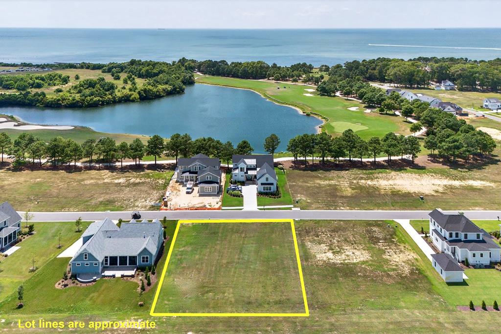 Build your Bay Creek dream home on spacious Muirfield Lot 94! Enjoy stunning western views and be just steps from the Life Center and beach entrance. This premium homesite is offered with a $25,000 credit toward the Membership Joining Fee at closing! No required timeline to build, and Builders Guild resources available and Architectural Guidelines make the process easy. Bay Creek is a vibrant coastal community with 27 holes of golf, 2 miles of private beaches, tennis, pickleball, scenic trails, and golf cart-friendly community! Close to the Historic District of Cape Charles with boutique shopping, restaurants, and so much more! Contact Listing Agent for more information today.