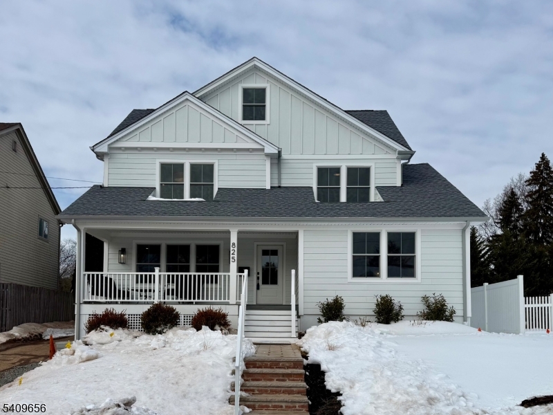 A truly stunning, fully renovated residence offering refined living across three levels, plus a finished basement. This home features 5 bedrooms, 4 full baths, and 2 half baths, showcasing a custom, brand-new kitchen, Family room fireplace with built in shelving on each side and designer finishes throughout. The thoughtfully modern layout includes a first-floor bedroom suitel. The 2nd level features a Jack-and-Jill bath shared by 2 bedrooms , a luxurious primary suite with walk in closet and spectacular spa-like bath plus a convenient Laundry Room. Up to a private third-floor retreat complete with a bedroom, full bath, and dedicated work area. An expansive 4-panel sliding doors lead to an elegant deck and patio perfect for sophisticated indoor-outdoor entertaining.
