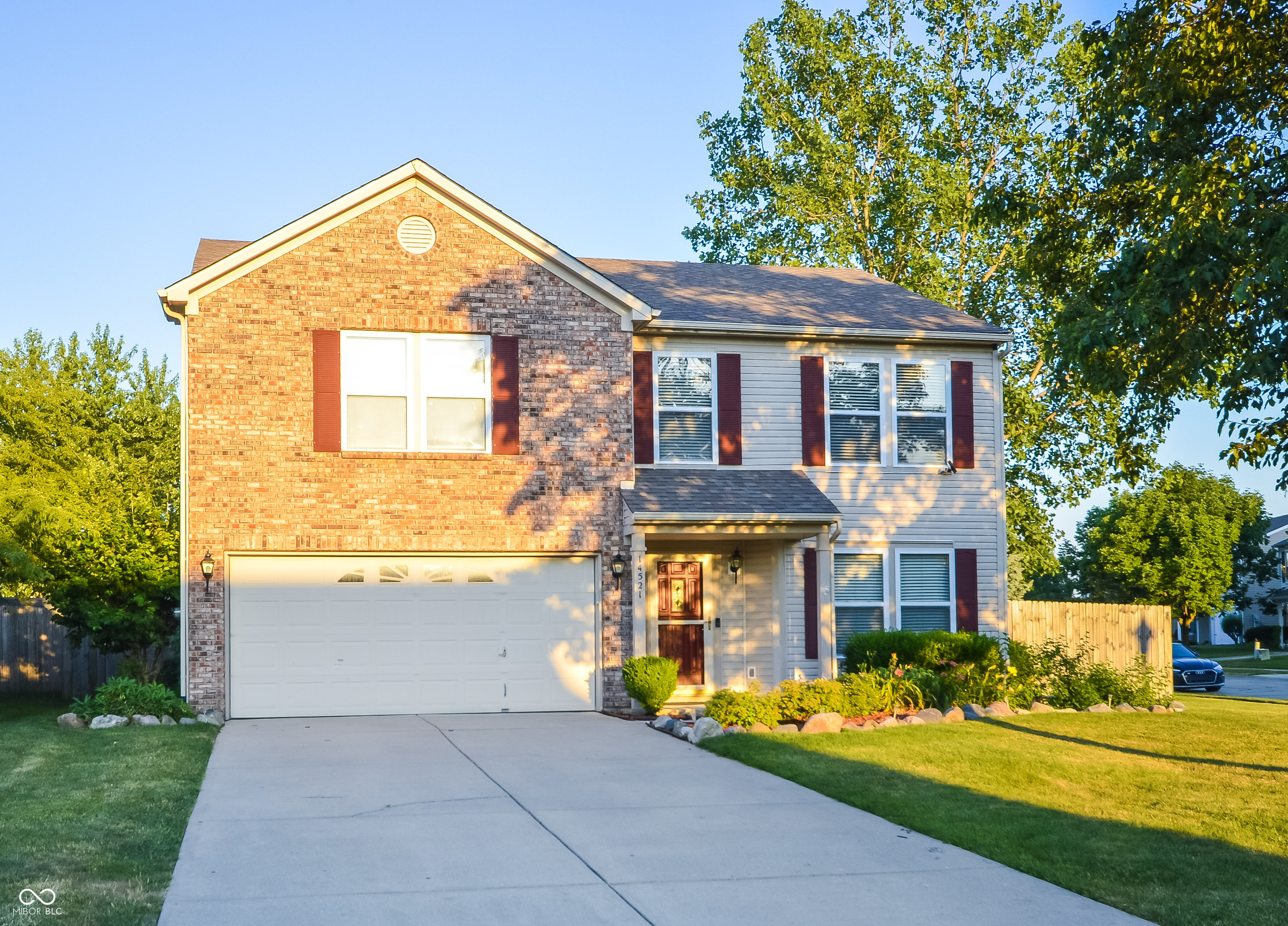 NICE!!!! Check out this fantastic 3 bedroom, 2.5 bath home situated on a corner lot in Fishers! On the main level, a welcoming living room greets you, featuring a beautiful fireplace that is a natural focal point. The well appointed kitchen is both stylish and functional, featuring gorgeous granite countertops that provide ample workspace and a touch of elegance. Plentiful cabinets offer abundant storage, while the backsplash adds style and visual interest. A pantry area with shelving off the kitchen adds additional storage. Also on the main level, you'll enjoy and half bath as well as a cozy den featuring french doors. This is the perfect space for your home office. Upstairs you'll find the spacious primary bedroom and bath as well as two additional bedrooms. You'll also find a second story loft area that provides additional casual living space and a convenient upstairs laundry room! Built in 2001, this home also boasts a 2 car garage and a fully fenced backyard, perfect for outdoor activities, and relaxation.