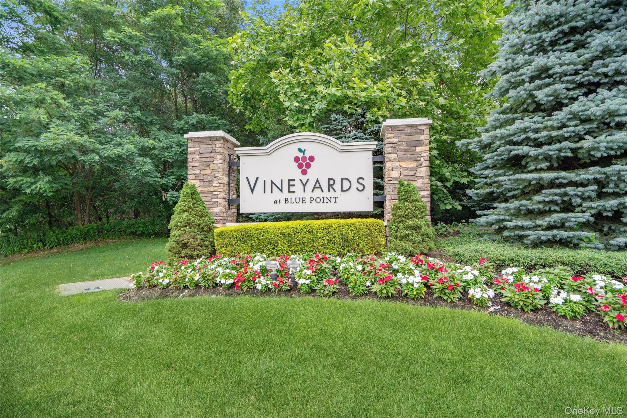 Welcome to The Vineyards at Blue Point, one of Long Island's most desirable gated 55+ communities. Built in 2019, this beautifully maintained first-floor Chardonnay model offers the perfect blend of comfort, convenience, and low-maintenance living.This spacious 2-bedroom, 2-bath home features an open-concept floor plan that's ideal for both everyday living and entertaining. Enjoy hardwood flooring, granite countertops, gas cooking, gas heat, and a thoughtfully designed layout filled with natural light. A full unfinished basement offers generous storage and versatile space to fit your needs. Life at The Vineyards is about more than just the home, it's about the lifestyle. Residents enjoy exceptional amenities including a clubhouse with a fitness center, card room, billiards, on-site physical therapy, a heated outdoor pool, bocce courts, fire pit, grilling area, and beautifully maintained grounds, all within a secure gated community.With low taxes, reasonable common charges, and a prime Blue Point location close to shopping, dining, parks, and major roadways, this is carefree living at its finest. Don't miss the opportunity to make this exceptional home your next chapter.
