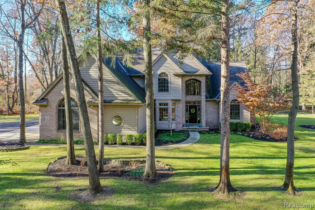 Welcome to this exceptional 4,823 sq. ft. estate nestled on 5 acres of complete privacy and seclusion. This meticulously maintained property offers an unmatched combination of luxury living, modern upgrades, and outstanding functionality for hobbyists, car enthusiasts, or business owners. The home features updated hardwood flooring and carpeting, smart switches throughout, a 2022 furnace and A/C, a high-efficiency tankless hot water system, and Wi-Fi thermostats for both the home and barn. A whole-house natural gas 24 kW generator, updated appliances, and spacious bedrooms with large closets make the home as practical as it is beautiful. Anchoring the property is an impressive 40' x 100' pole barn, fully outfitted with 100-amp service, 220 volt with 40 amp EV charging, Cat 5 networking, three smart garage doors, and a separate septic system. The barn includes a massive 75' x 40' cold storage area with a 14' x 40' loft, plus a 25' x 40' heated workshop/storage space complete with EV charging, water, and a half bath. This setup is ideal for those needing high-end workspace, storage, or operational flexibility. Additional highlights include a 1,700 ft paved driveway installed in 2023, a 3-car attached garage, LED lighting throughout, a 2014 roof on both structures, and a well pump replaced in 2022. Nearly the entire property can be automated, offering a truly modern and turnkey experience. This is a rare opportunity to own a private, fully equipped estate with every amenity imaginable. Perfect for those seeking space, capability, and complete peace of mind.