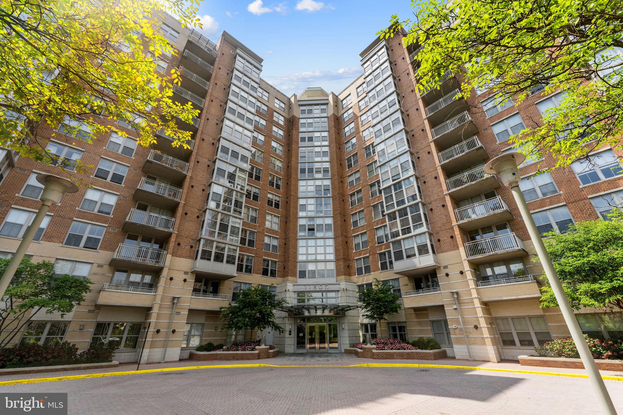 Welcome to the conveniently located Carlton House! This 1 bedroom 1 bathroom condo comes with an assigned garage parking spaces and a storage unit! Located across from Reston Town Center. This well maintained unit has plenty of natural light and feels like home from the minute you enter the door. The bedroom is spacious and has a large closet with an ensuite bathroom. The living room is full of natural light and walks out to a private balcony backing to trees. This unit has a washer/dryer laundry closet for added convenience. The Carlton House's top notch amenities include a secure entry with a front desk concierge, a big-screen media/theater room, a business center with unlimited copying, printing, and faxing service, a large fitness/exercise room with a snack bar, a rooftop club room, billiards room, swimming pool, and terrace with gas grill. The Carlton House is located just one block from Reston Town Center dining, shopping, and entertainment! Walk to metro station(s), Whole Foods, Trader Joe's, Harris Teeter and the new Wegmans. Minutes to Dulles Airport, Toll Road, Rt 7, Tyson's Corner, and downtown Washington DC. The Washington & Old Dominion paved trail access is just outside your front door. A very pet-friendly building.